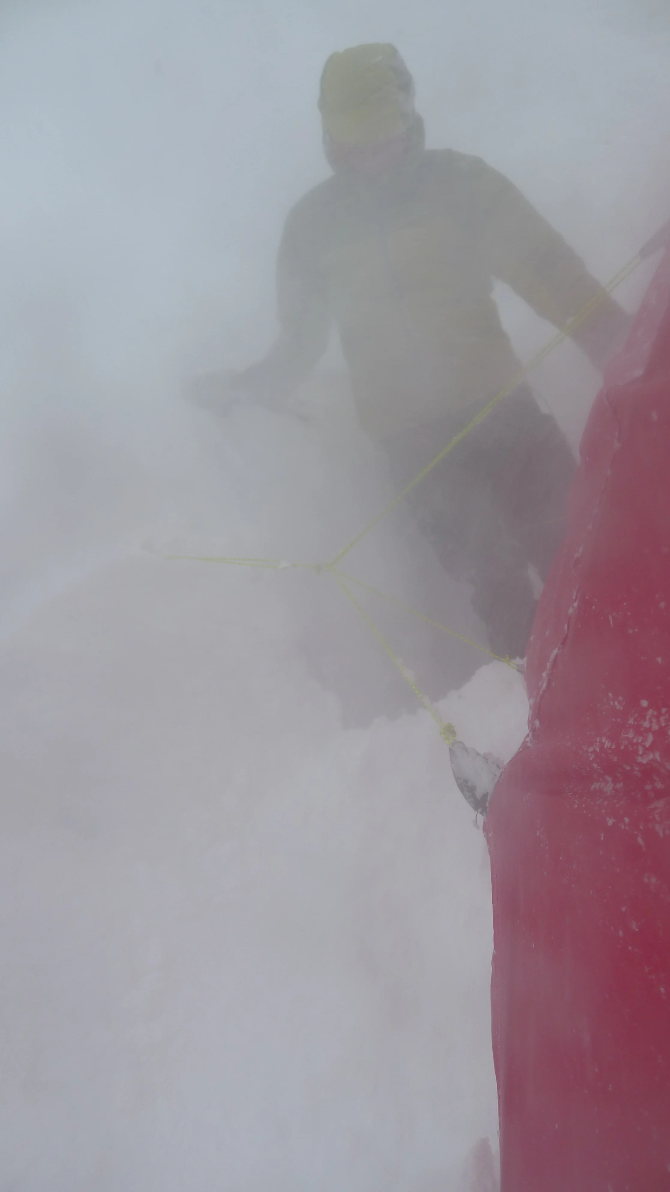 digging out the tent during bad weather on monday morning. Photo: Tony Stone