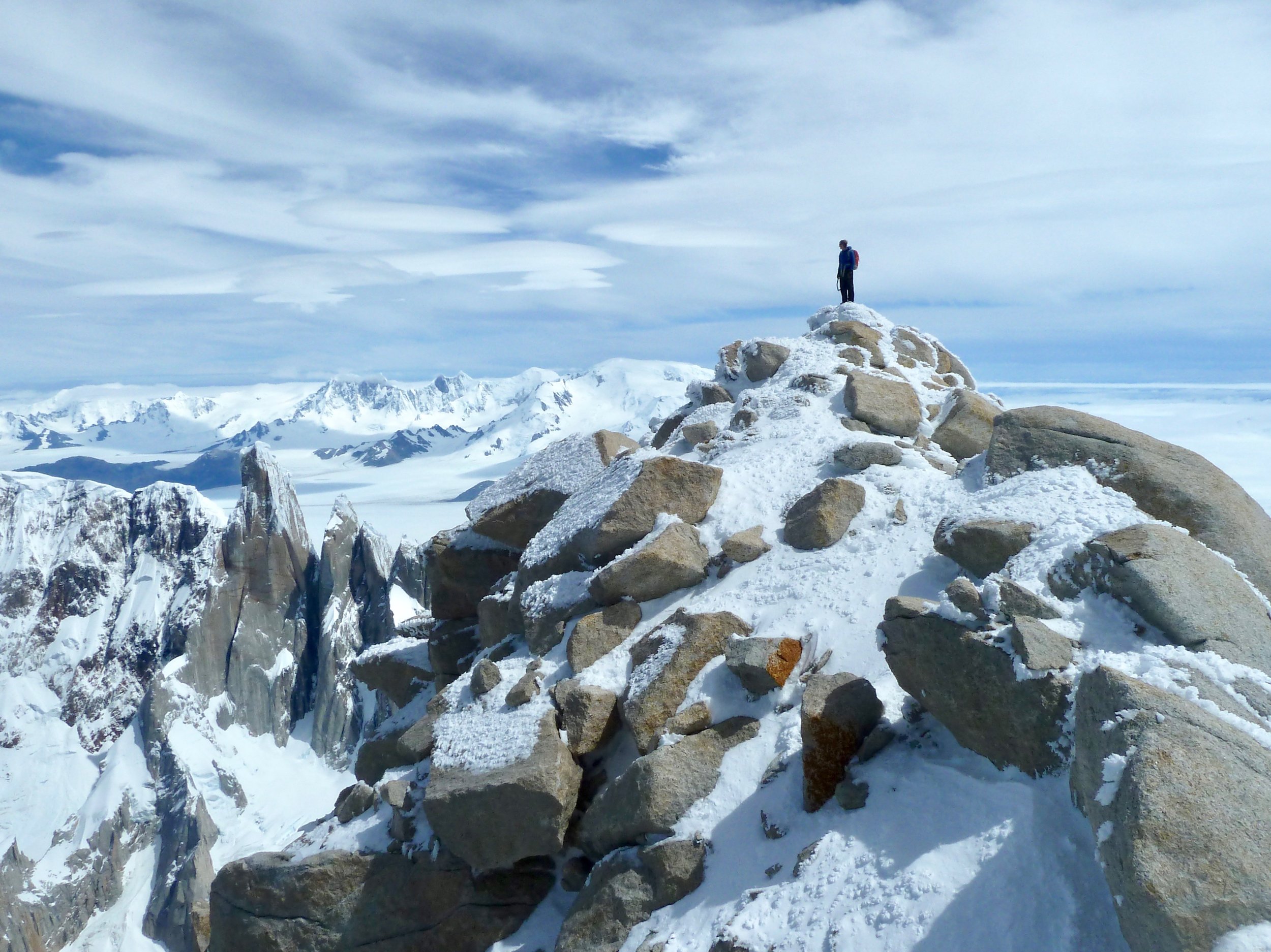 tony stone on the summit of fitzroy. patagonia.