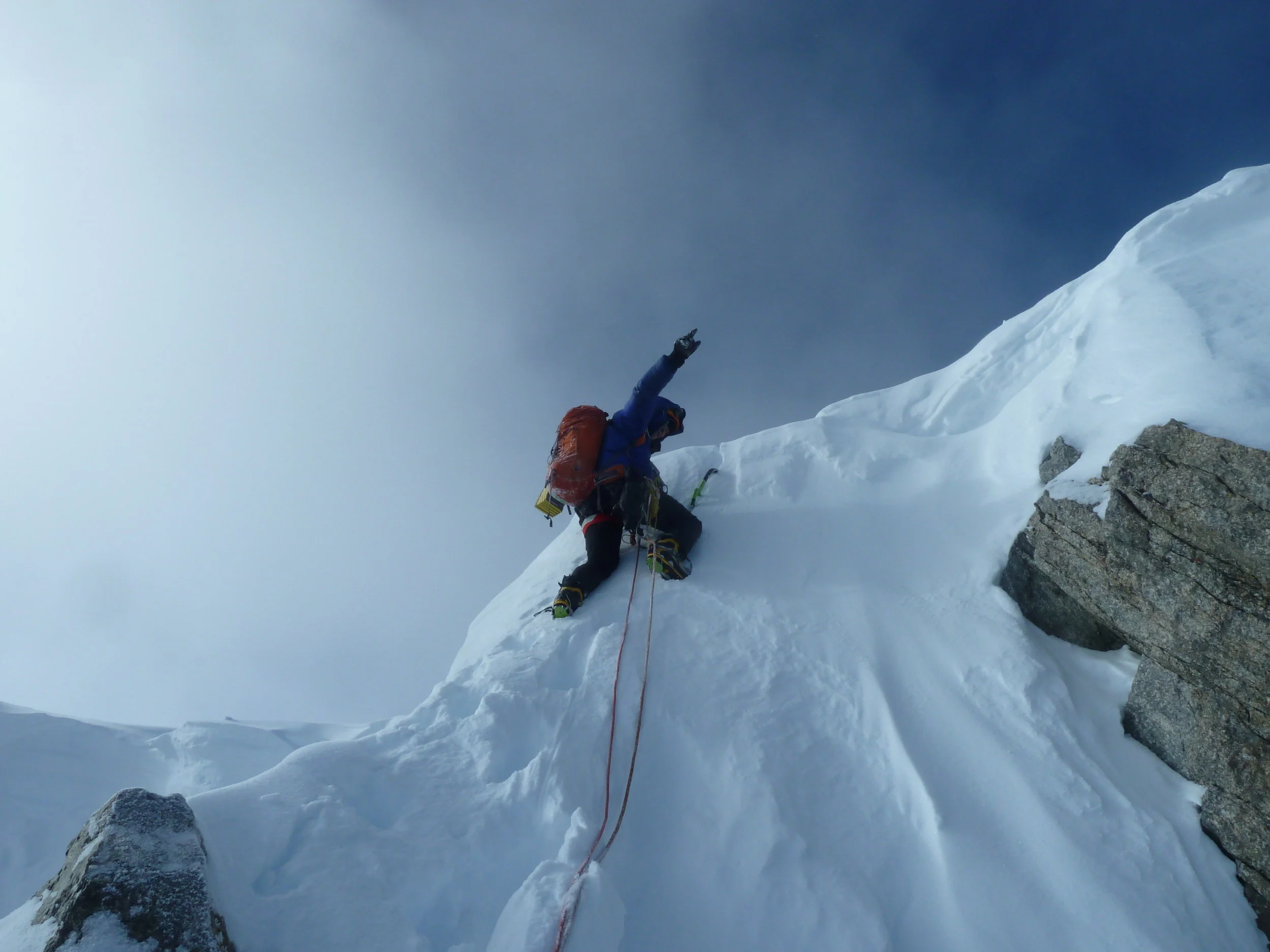 Pete Graham tops out after a winter ascent of the Walker Spur, Grandes Jorasses.