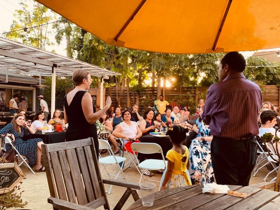  Neighbors gathering at The Rental Girl in Highland Park to share a meal and hear from resettling Angelenos 