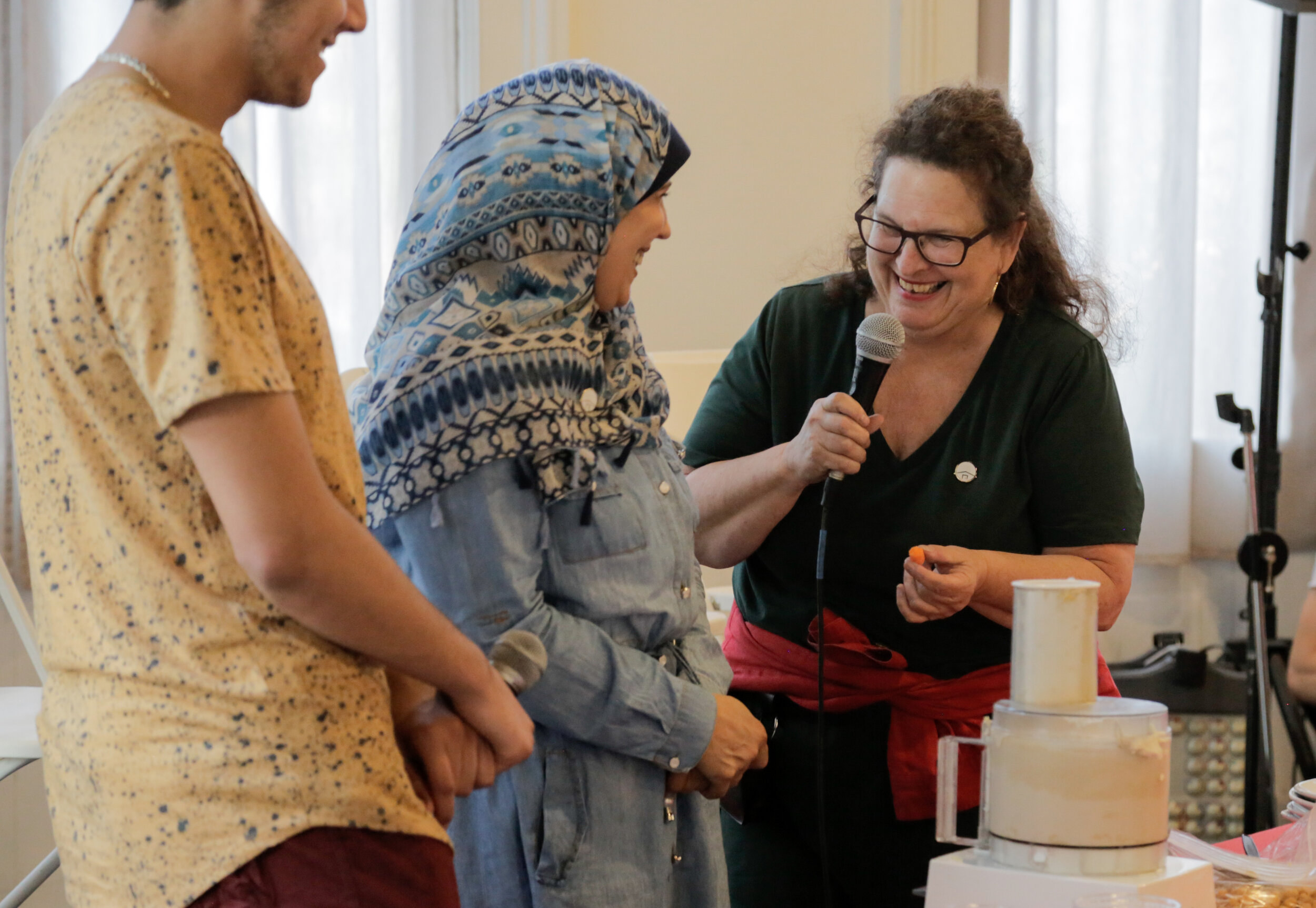 Chef Abeer of Syria demonstrates her hummus recipe with Miry's List ambassedor Evan Kleiman.jpg