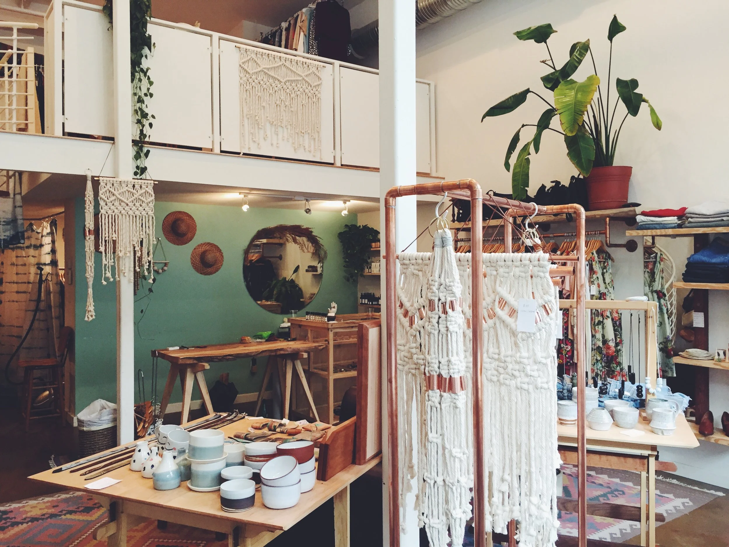 WALL HANGINGS AND PLANTERS AT ROSEWOOD CLOTHING CO, RICHMOND, VA