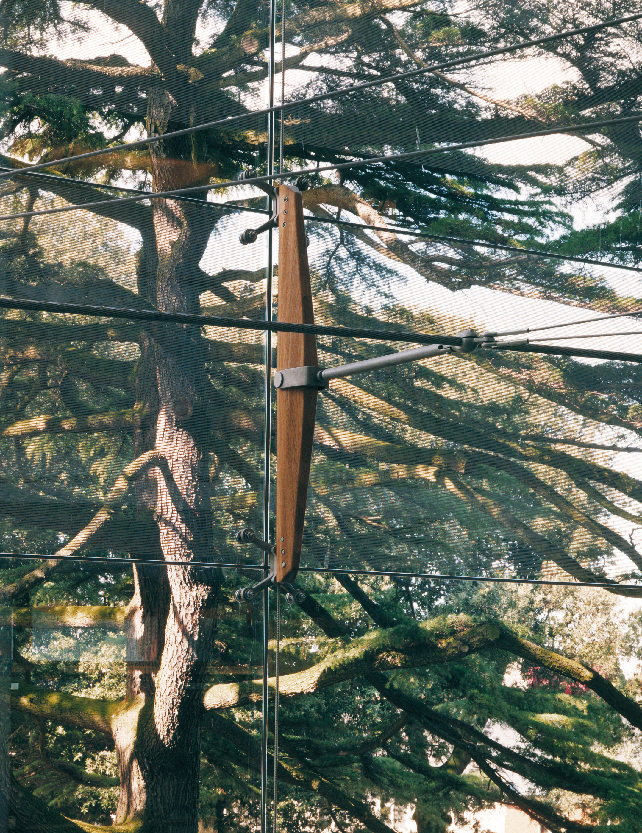 Fig. 6 Timber spar support to suspended glass