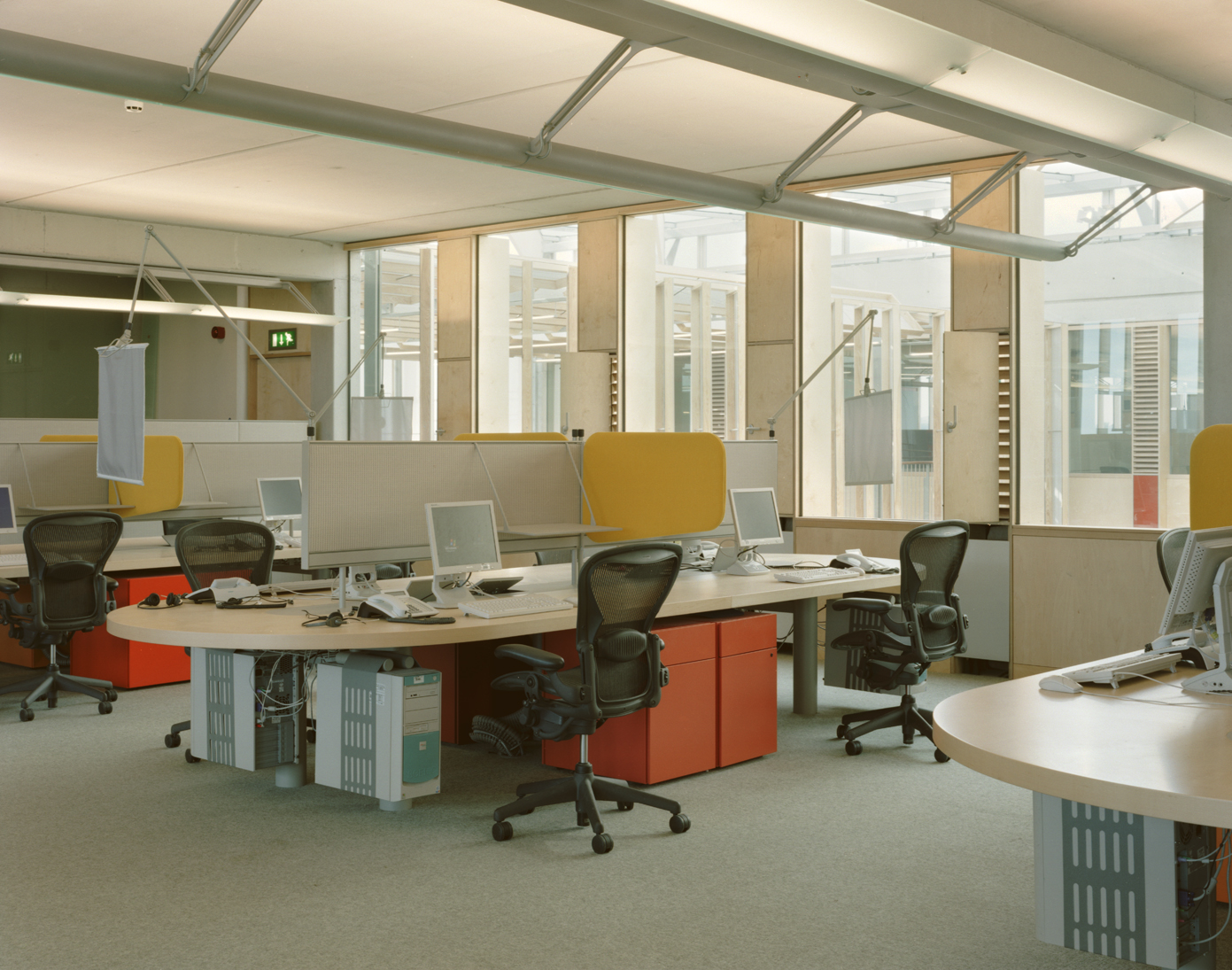 Fig. 11 Interior office space with Bucholz McEvoy designed shared table-desk incorporating glare control and acoustic privacy panels
