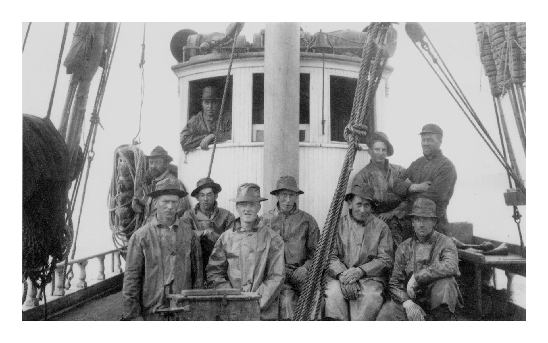 crew-on-deck-in-raingear-front-of-wheelhouse_bw_4x6-300dpi.jpg