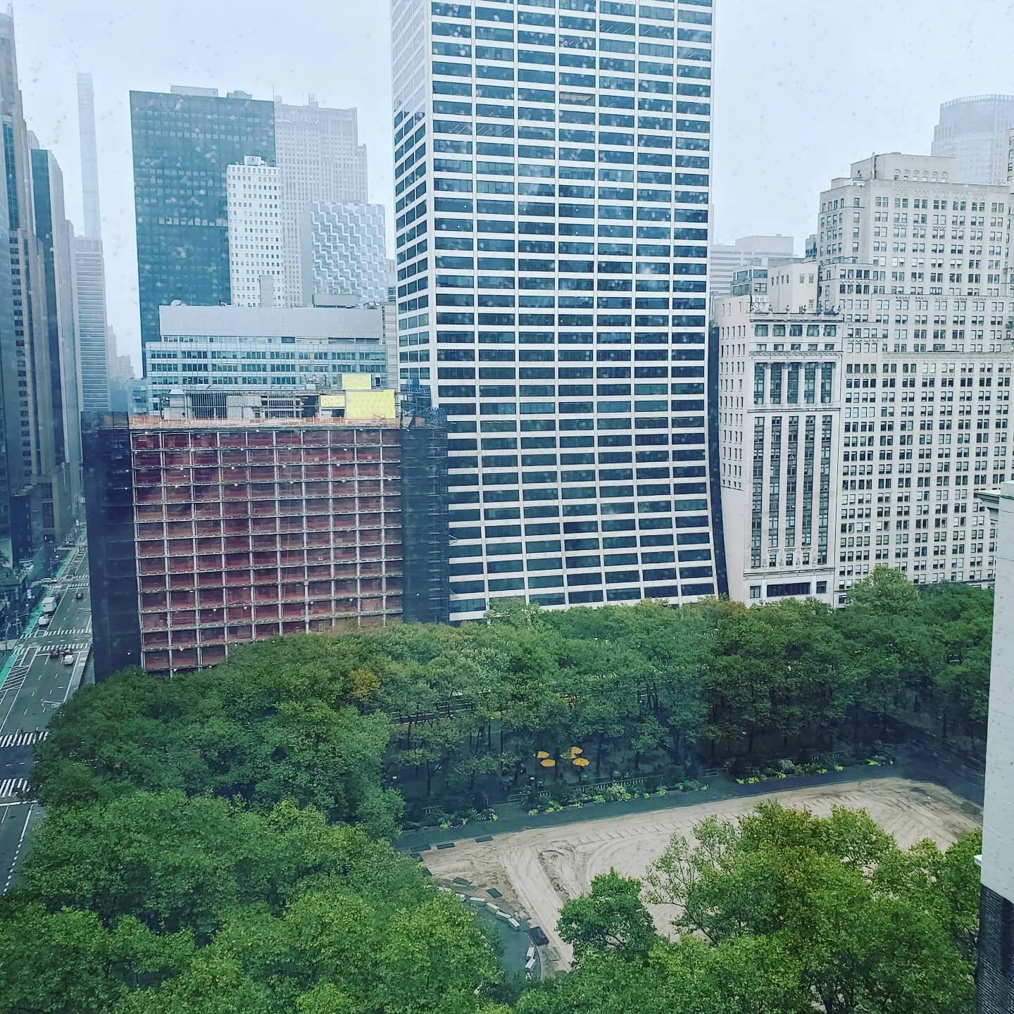 So excited to watch the @bryantparknyc Winter Village and ice skating rink take shape on this rainy Columbus Day off. I was concerned that it would be canceled this year. #tistheseason #nycrebound #winteriscoming