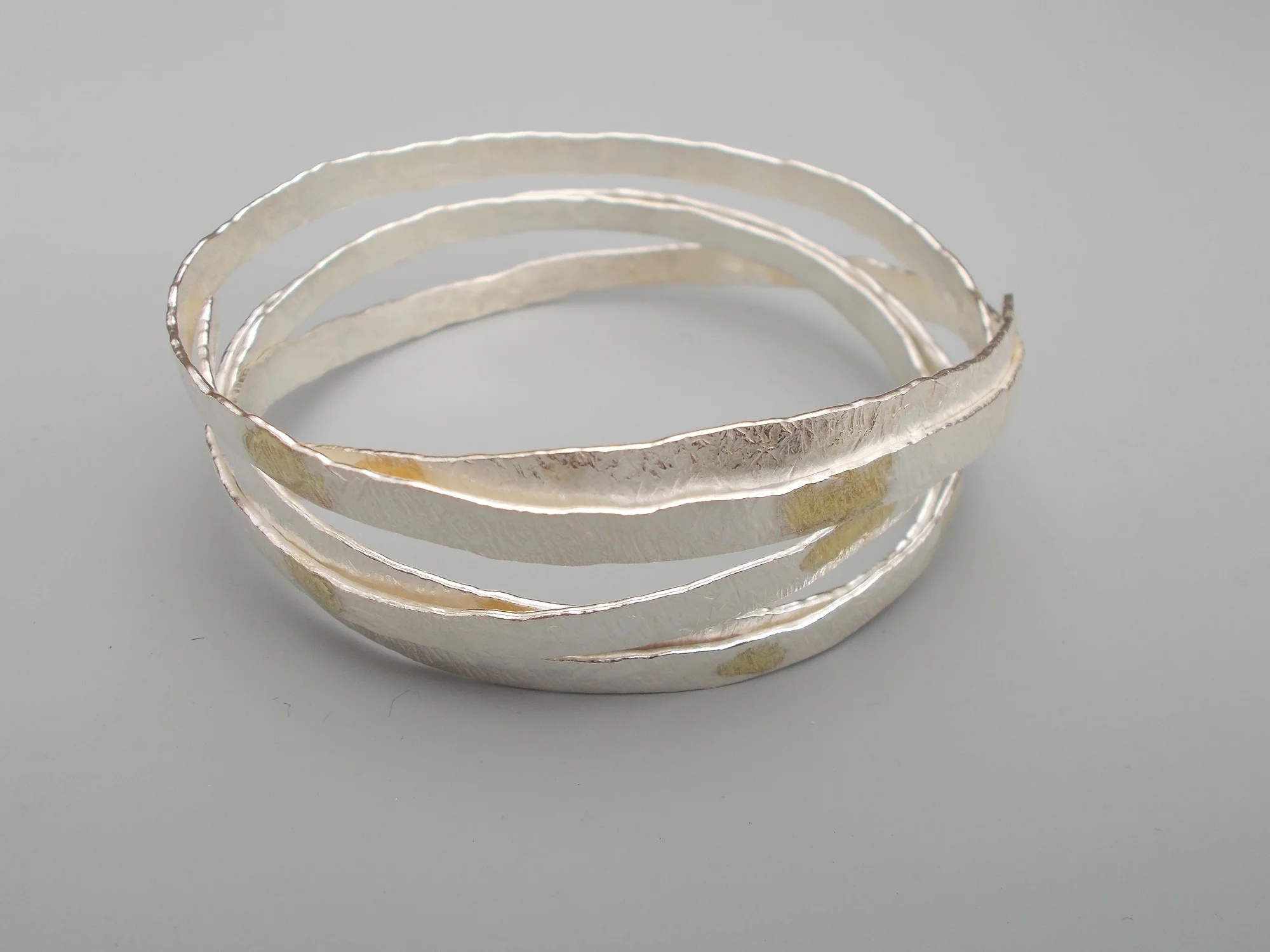 "endless wrap with 18k gold" bracelet