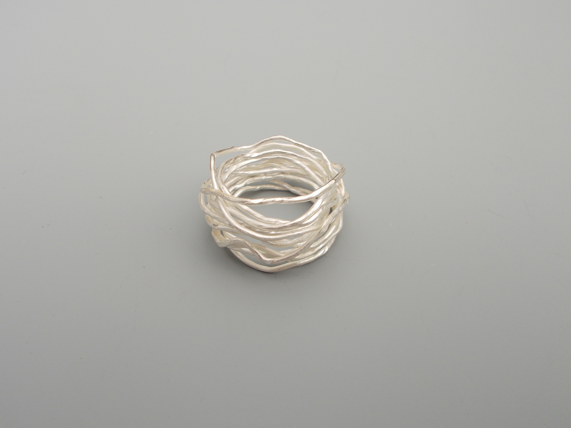 "nest" ring