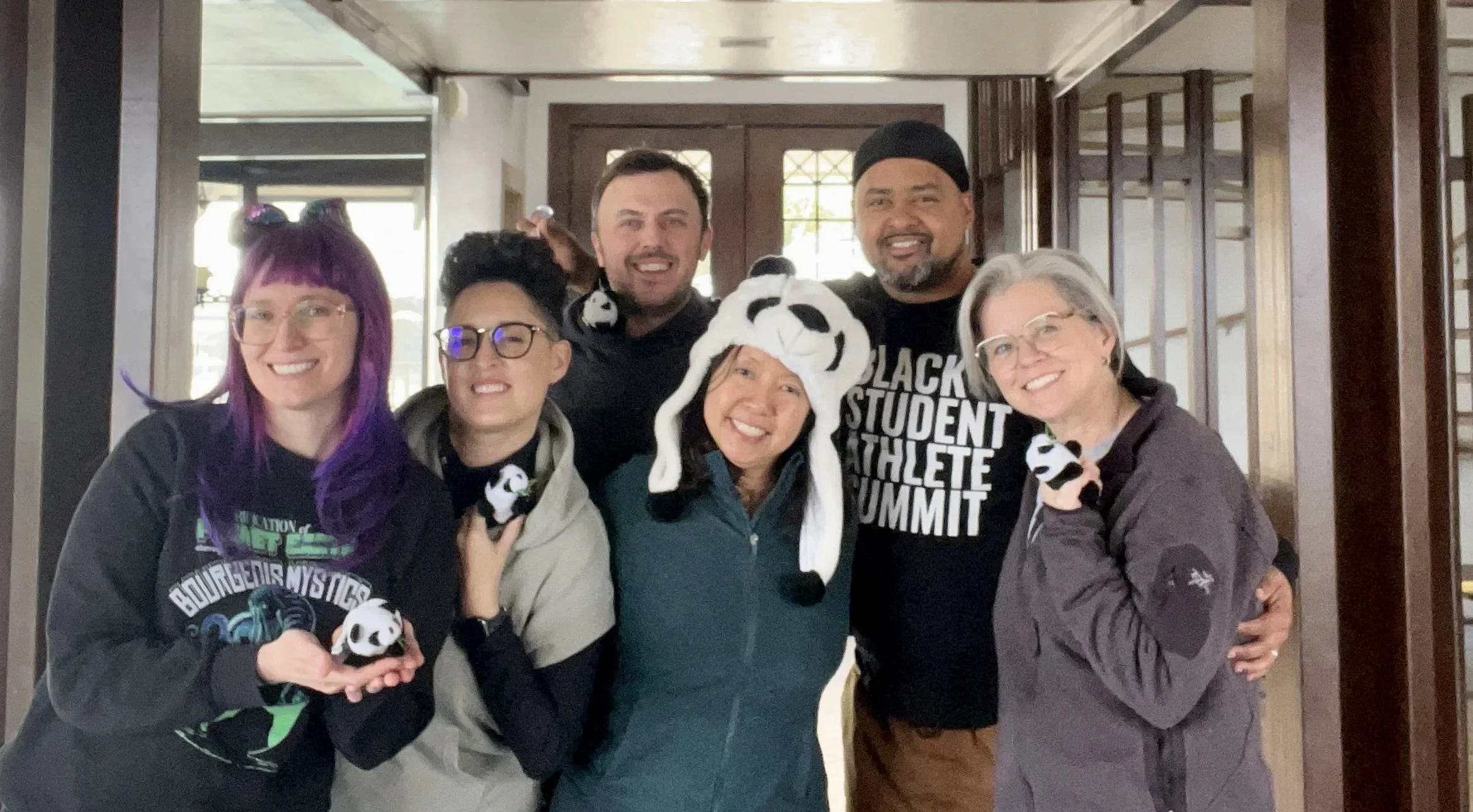 Dr Lynn Chang with smiling faces during a work retreat 