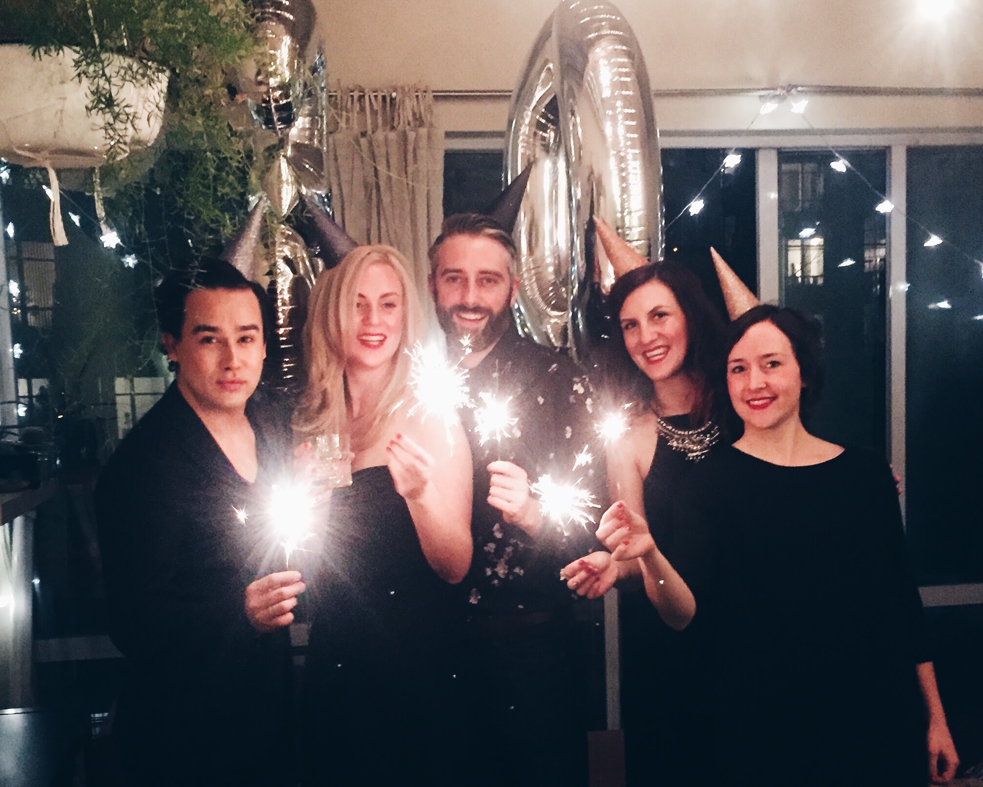 DIY metallic ombre glitter party hats for a classy 30th birthday + balloons + sparklers