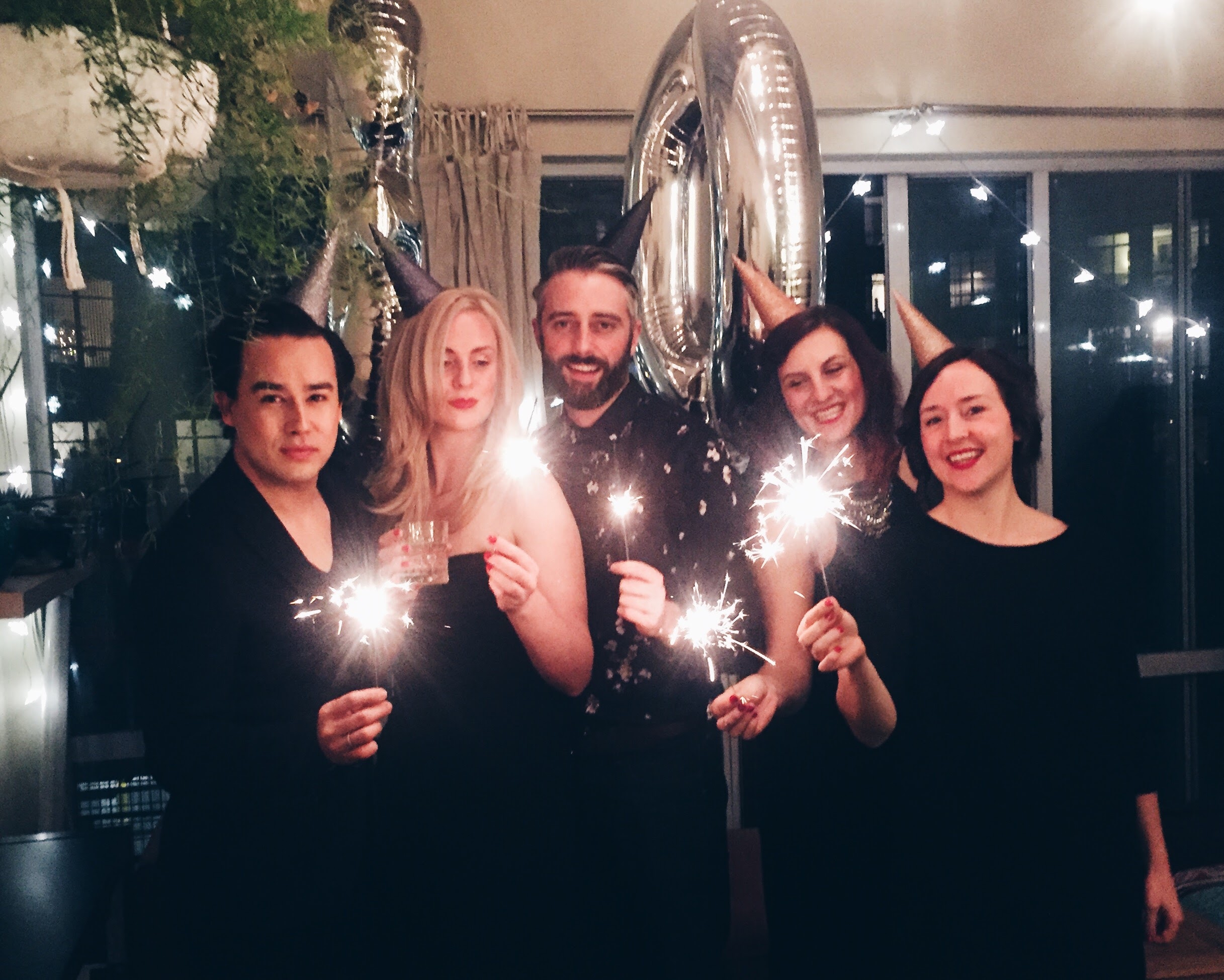 DIY metallic ombre glitter party hats for a classy 30th birthday + balloons + sparklers