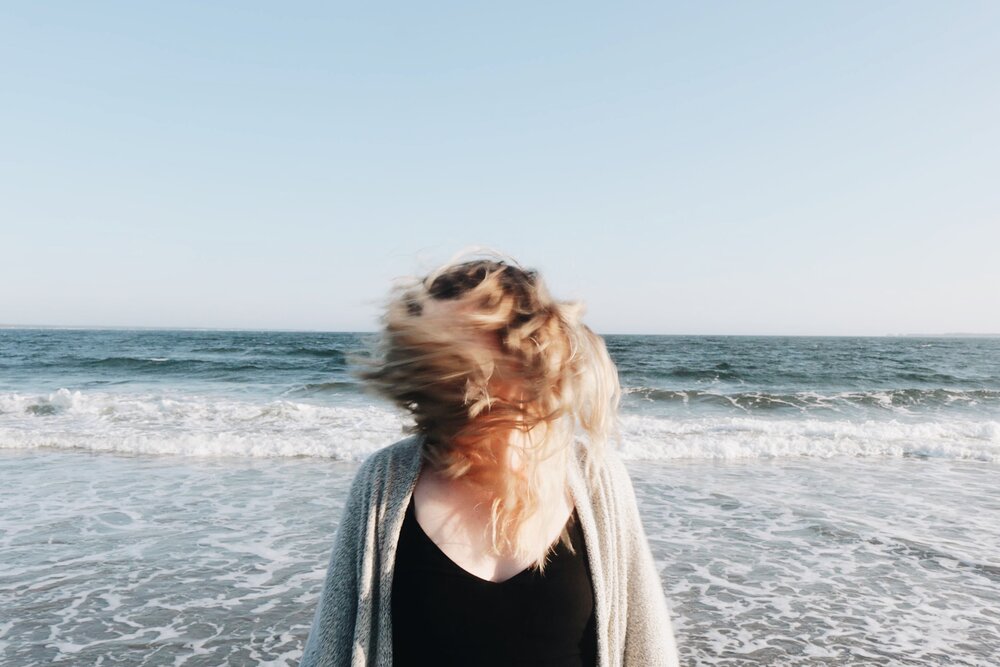 hair blowing in the breeze