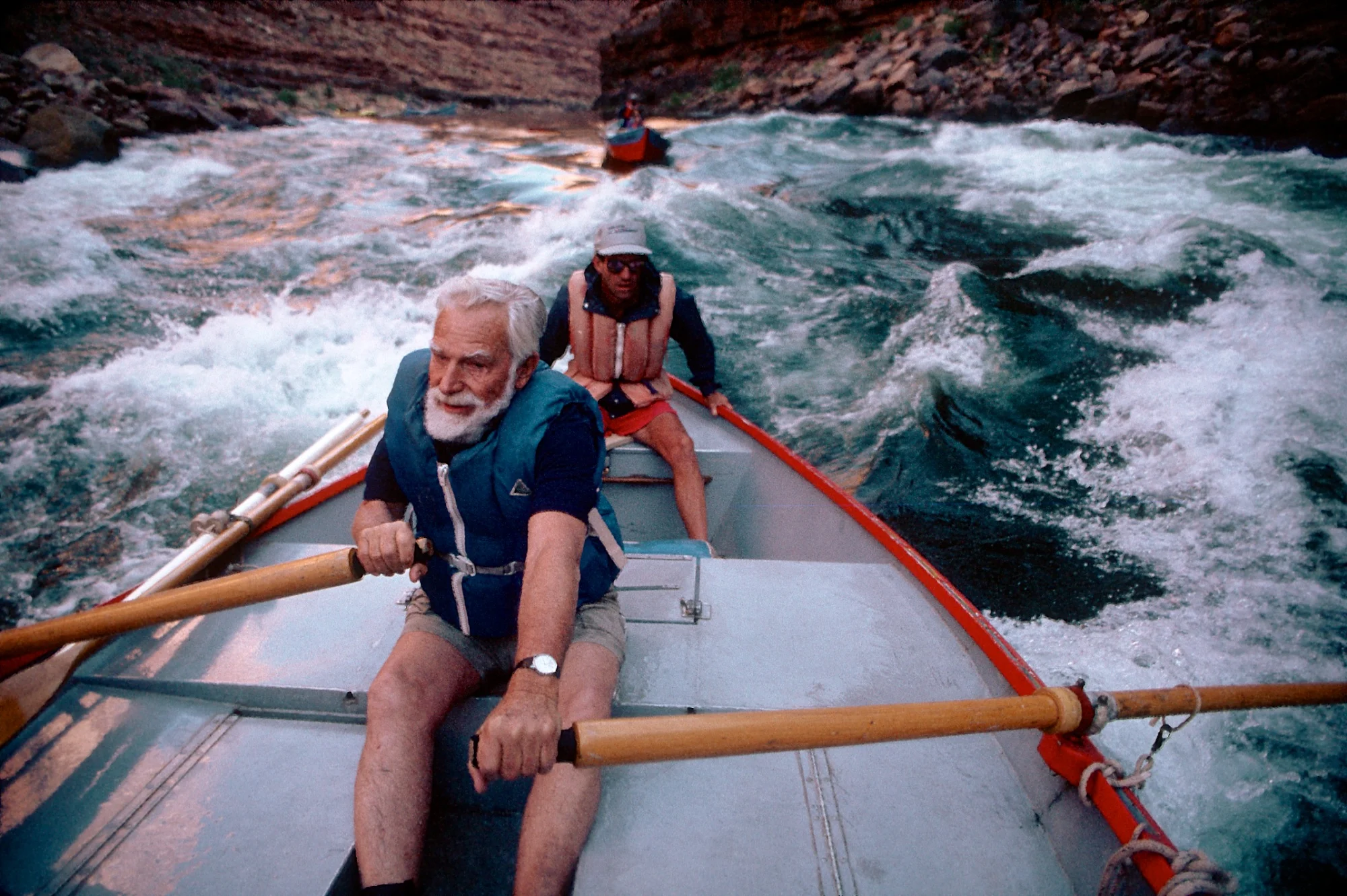 Martin Litton rowing through the Grand Canyon of the Colorado. By Jim Richardson