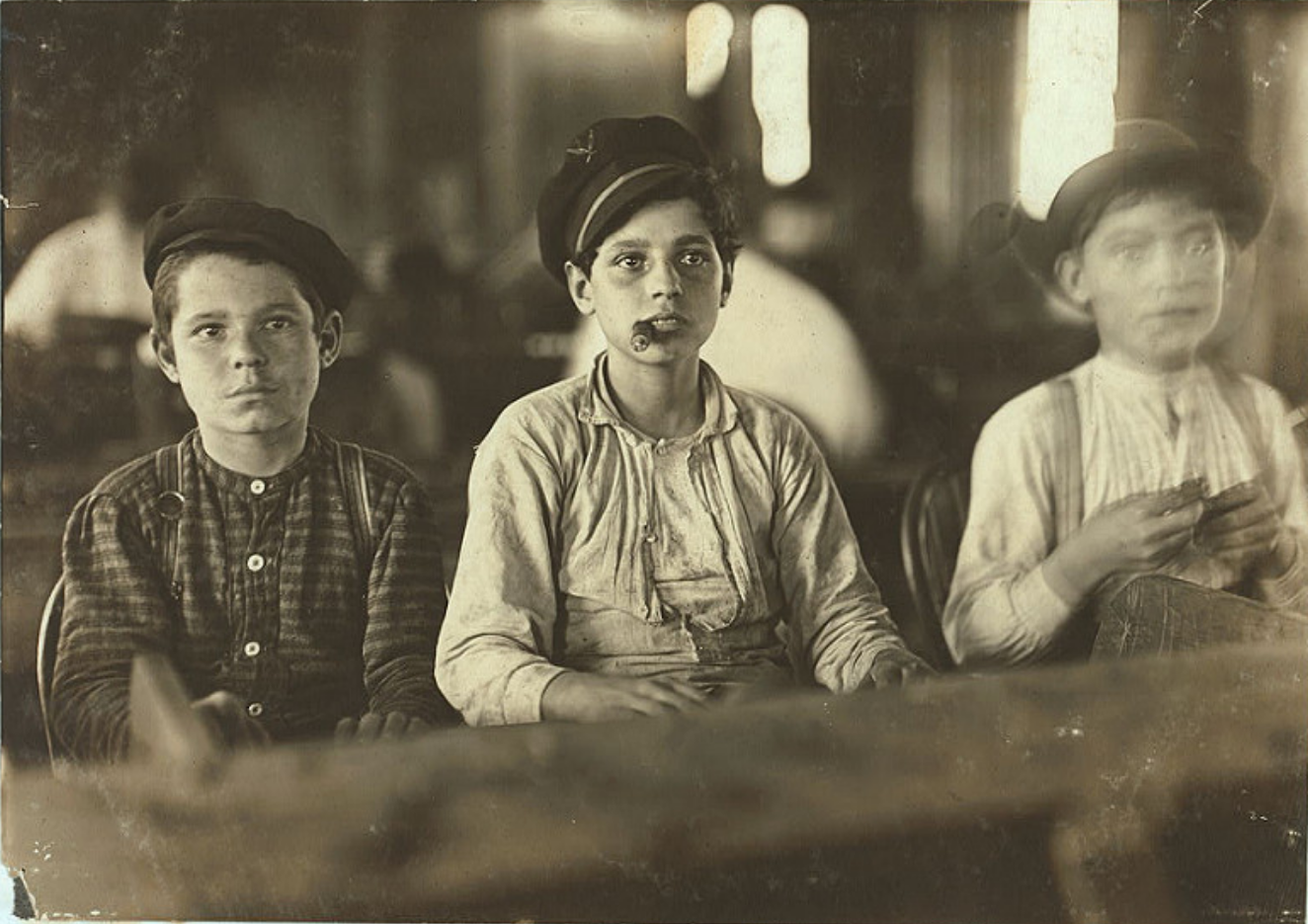 Young cigar makers in Englahardt & Co., Tampa 1909 By Lewis W. Hine.