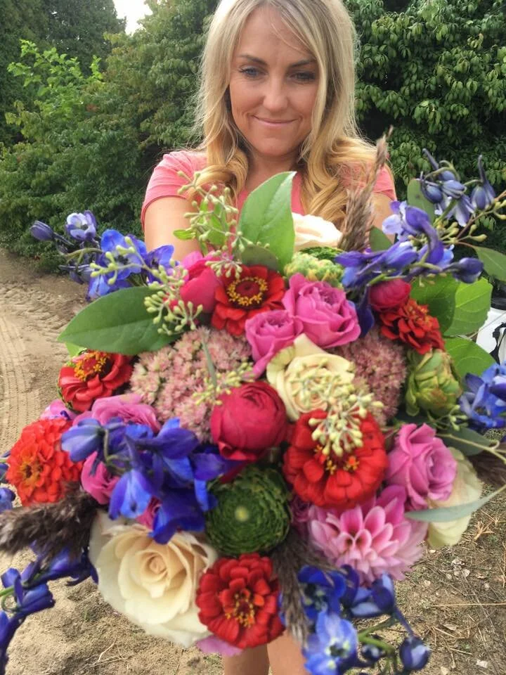 Jenny and bouquet at farm.jpg