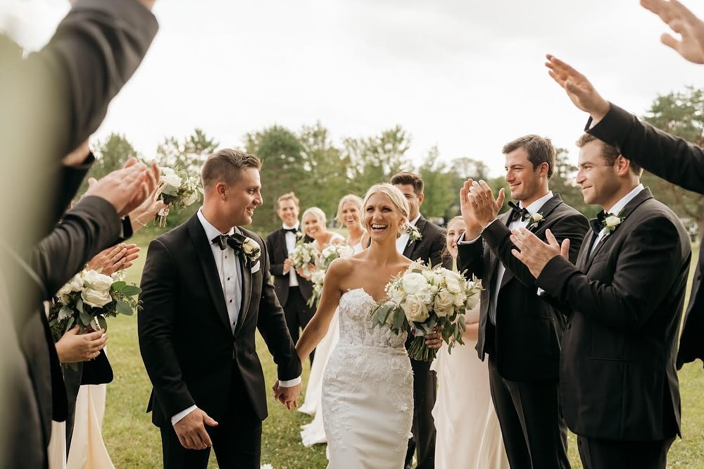 Happiness is...
...The spark of joy you make in someone&rsquo;s eye.
...Being surrounded by the best gals and pals you could imagine.
...Celebrating vows in that special place with family
...Presenting a proud mom with a corsage on wedding day
...Toa