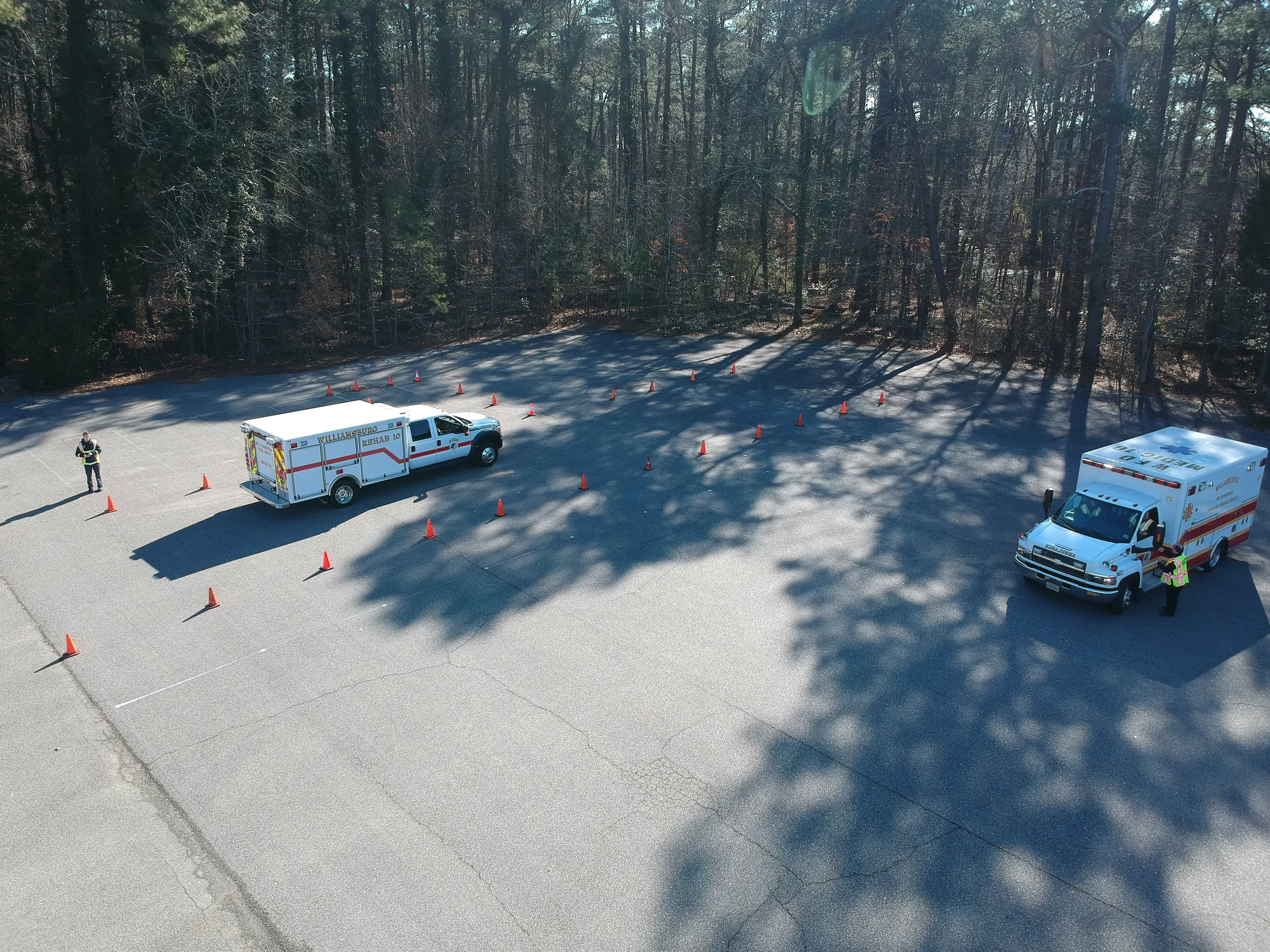 Members taking the class were tasked with weaving through cones and backing up into different parking spaces.