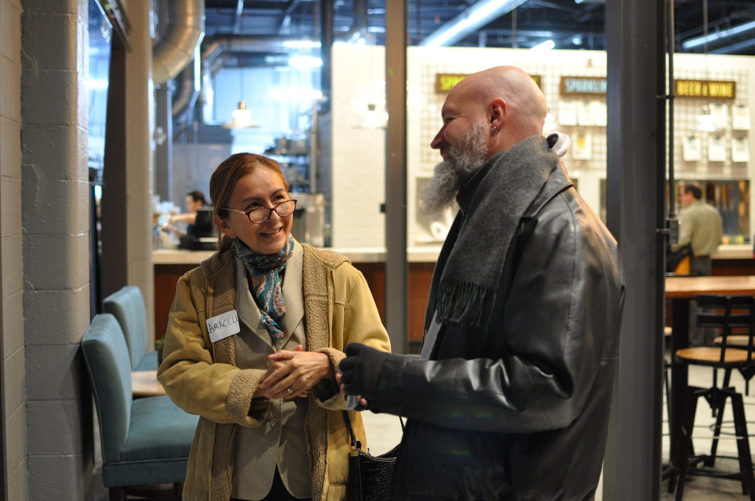 Attendees talk at Co-op Cincy's 2022 annual dinner.JPG