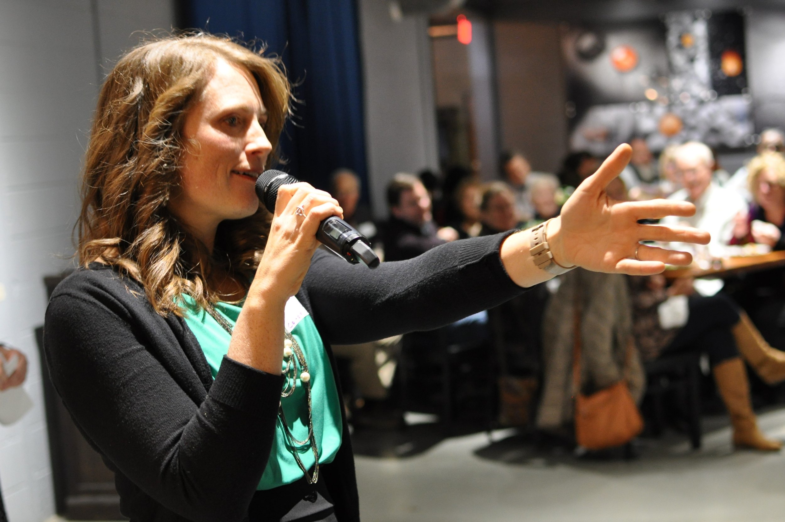 Co-Director Ellen Vera speaking at at Co-op Cincy's 2022 annual dinner.JPG