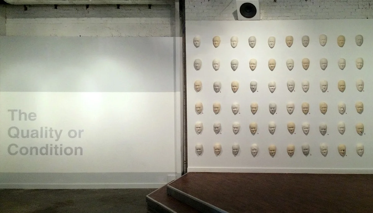 TQOC-title-wall-web.jpg