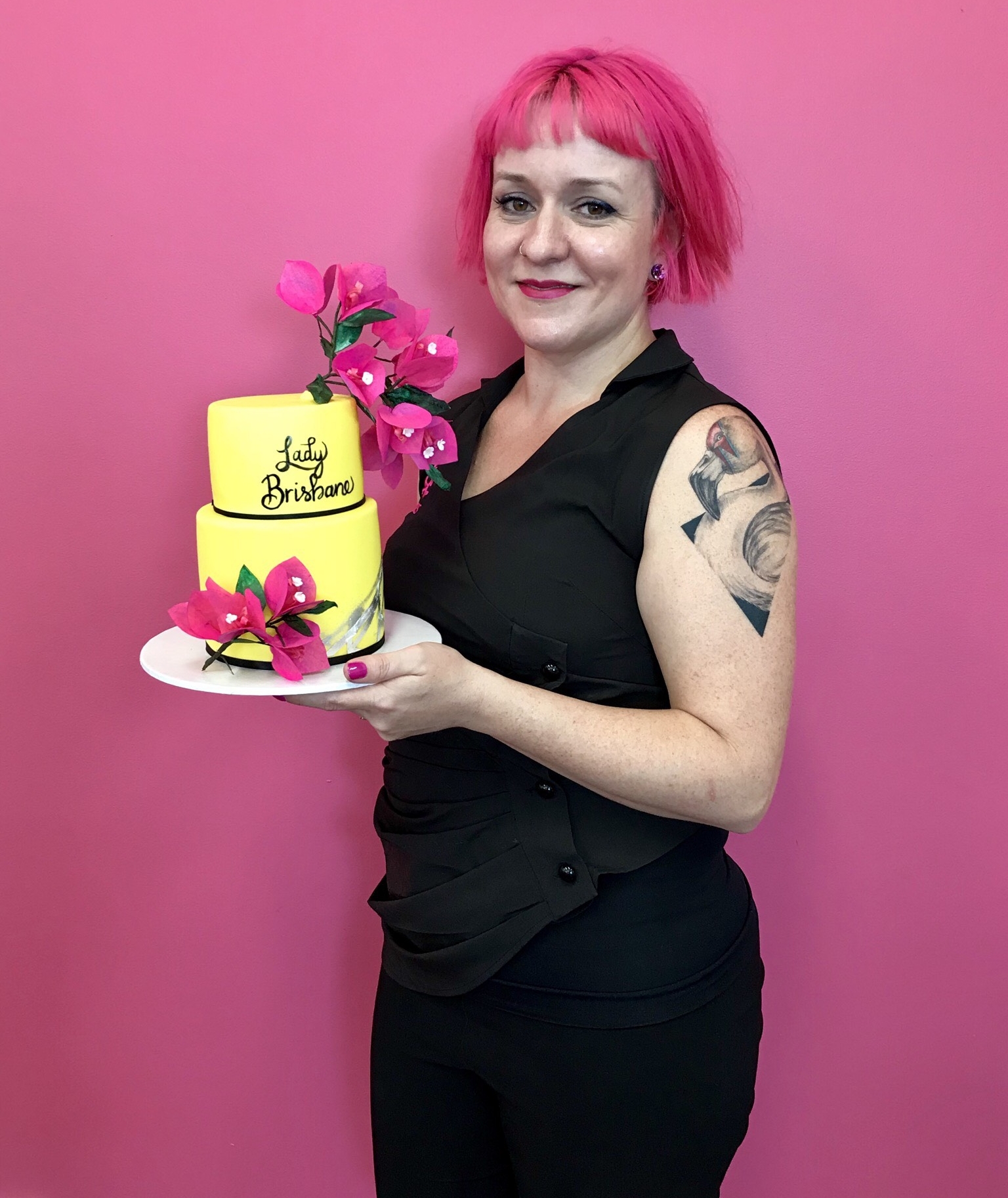  Zoe Byres with the Lady Brisbane cake. 