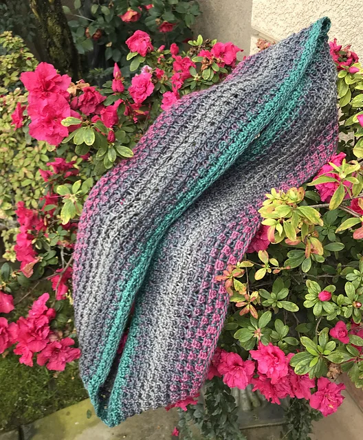 DBukko’s extra long Bramen Cowl , which can be worn doubled! Knit in Schoppel Gradient shade Fan Block/Fankurve