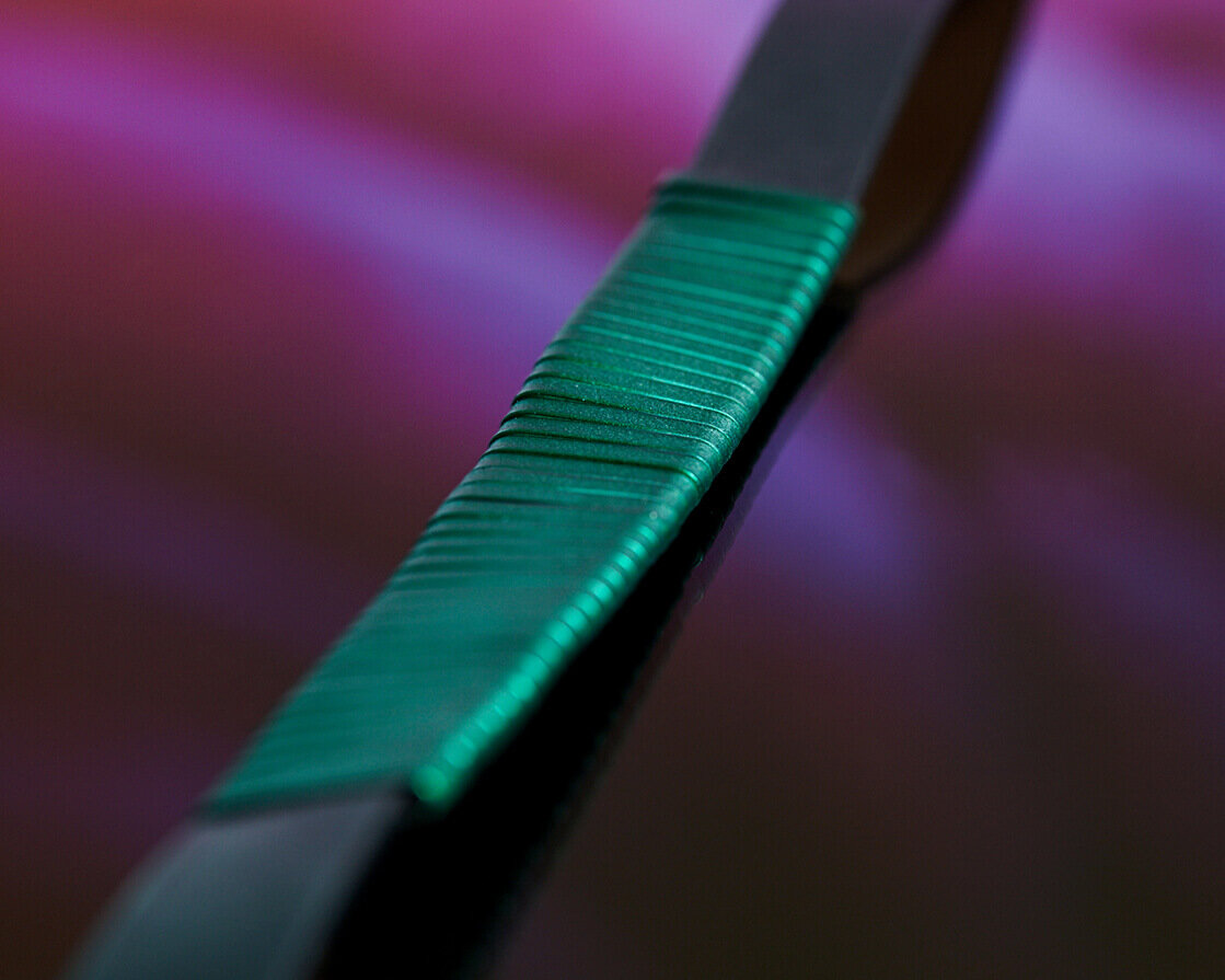 Close up green belt with purple background. LN-CC online creative.