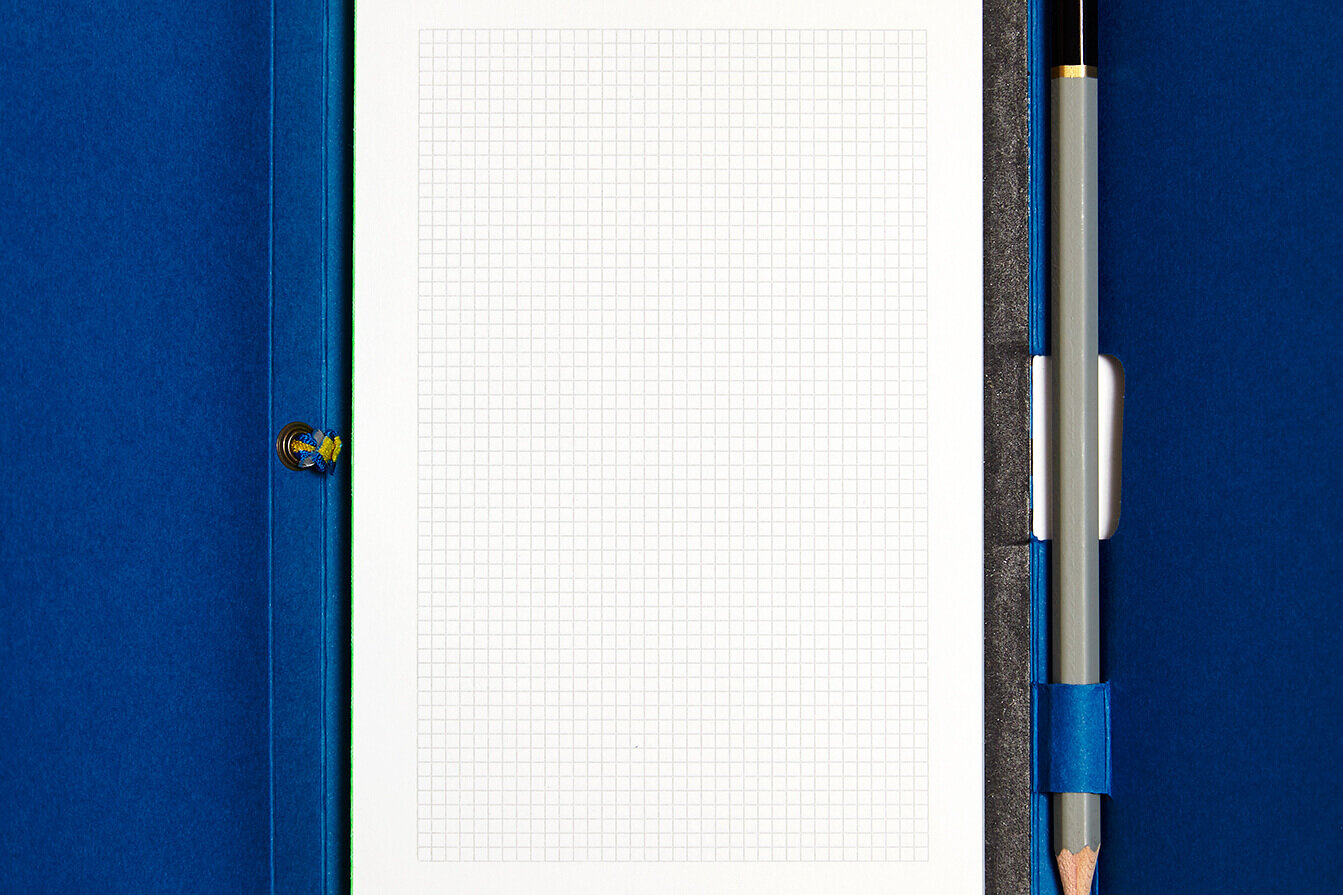 Not Another Bill open notebook. Ecommerce product image. Blue and Black.