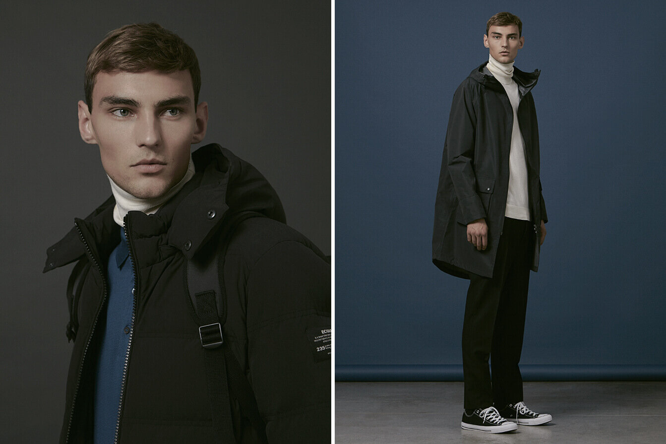Male model wearing Ecoalf jackets in studio. Grey and Blue backgrounds.