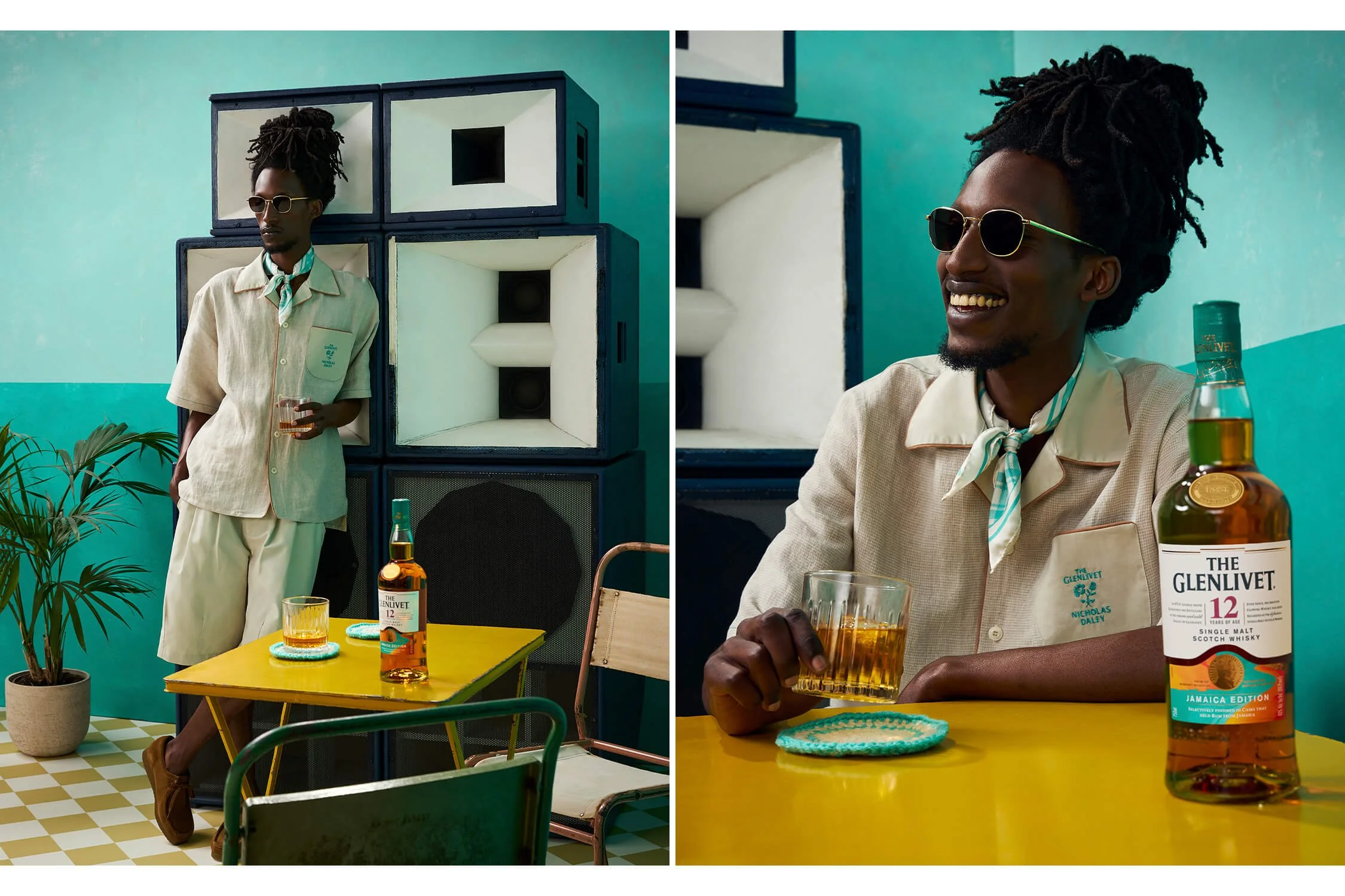 male model holding whiskey glass, stood in front of speakers. model smiling and enjoying whiskey.