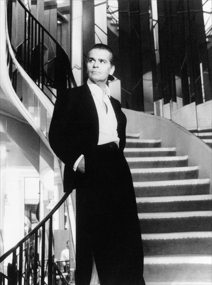  'Karl Lagerfeld on the stairs of Chanel, 1983' © The Helmut Newton Estate / Maconochie Photography 