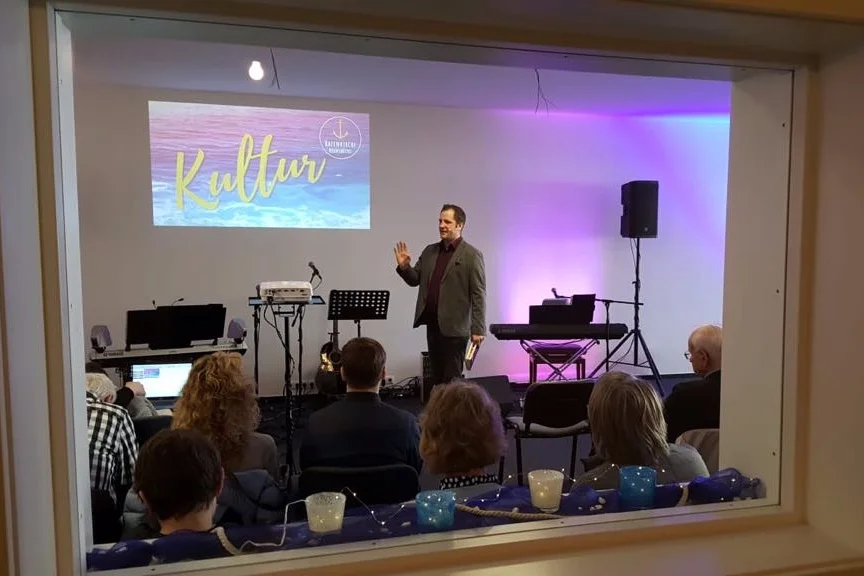 Achim Preaching