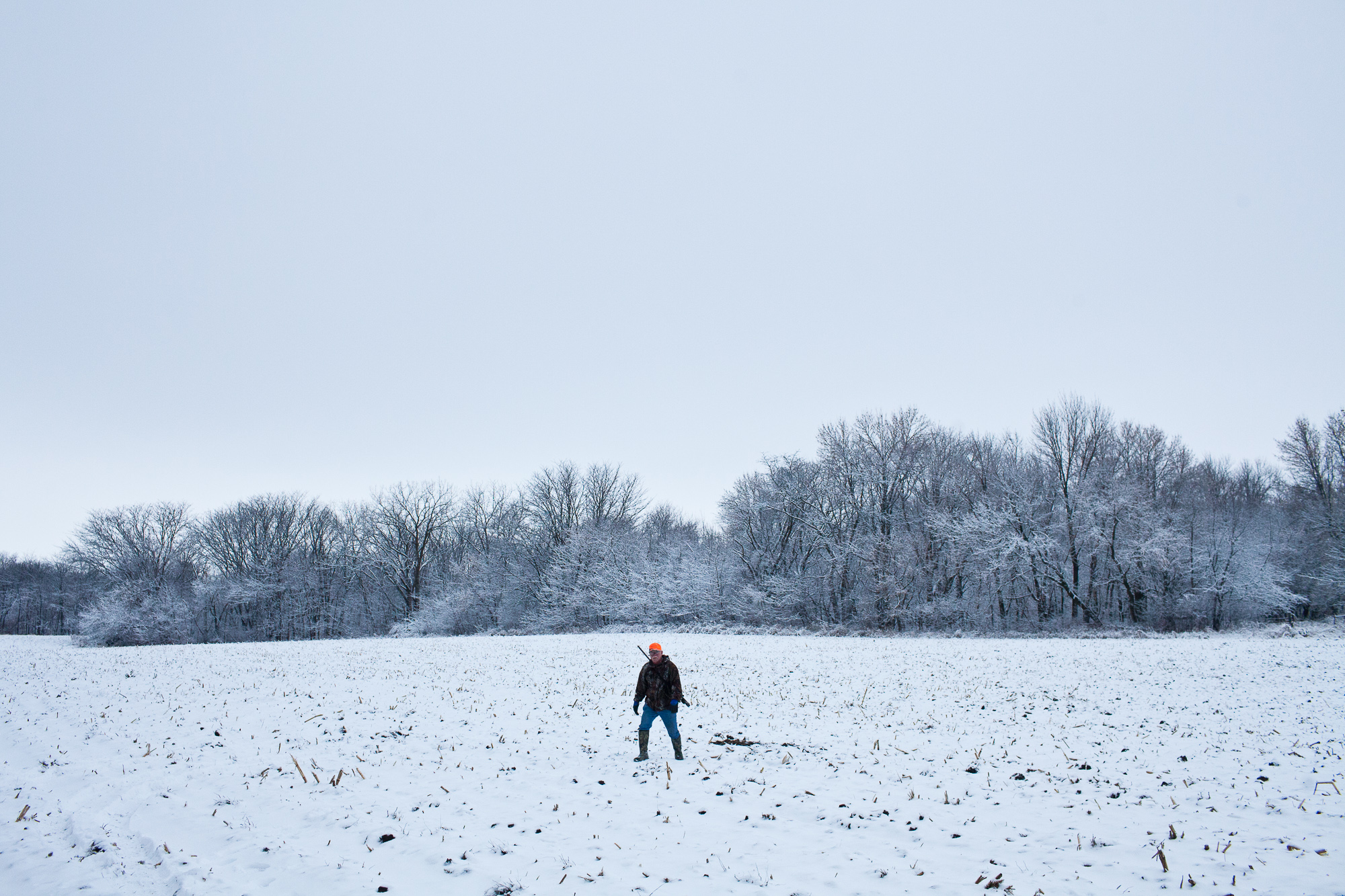  Mike Johnson stands in a corn field while deer hunting on Sunday, December 4, 2011 in Webster City, IA. 