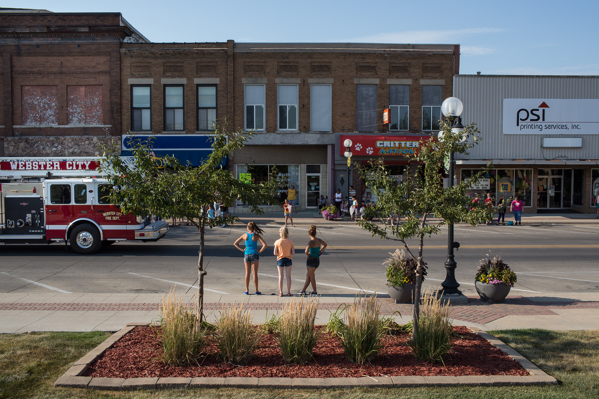  Girls watch the Hamilton County Fair Parade on Monday, July 23, 2012 in Webster City, IA. 