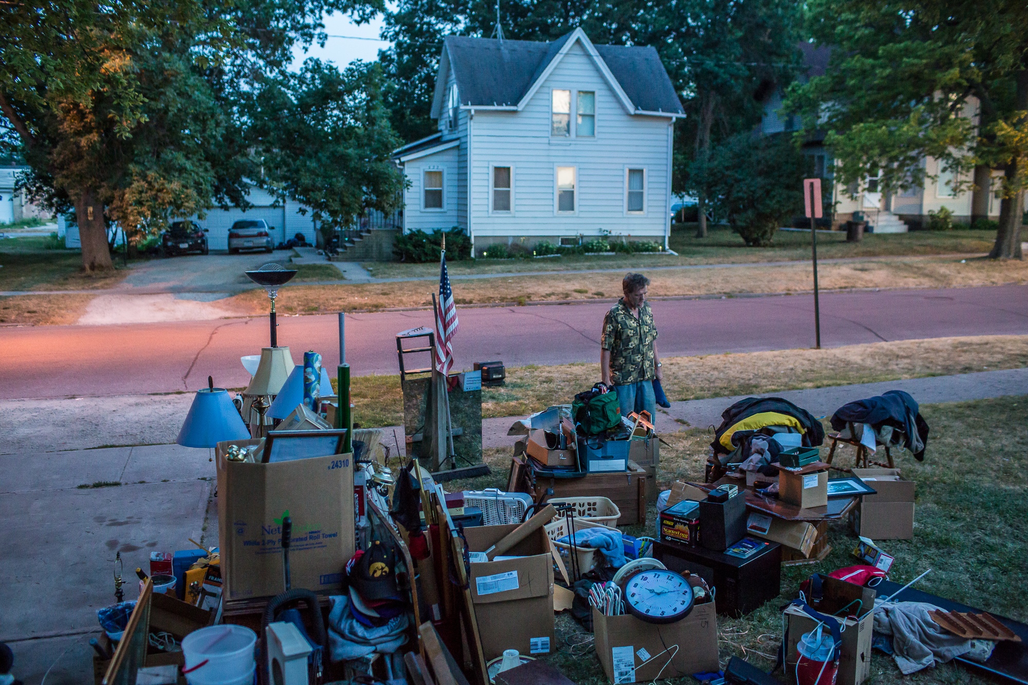  Lloyd Heslop looks at his belongings scattered in the yard after being evicted from his apartment on Monday, July 16, 2012 in Webster City, IA. 