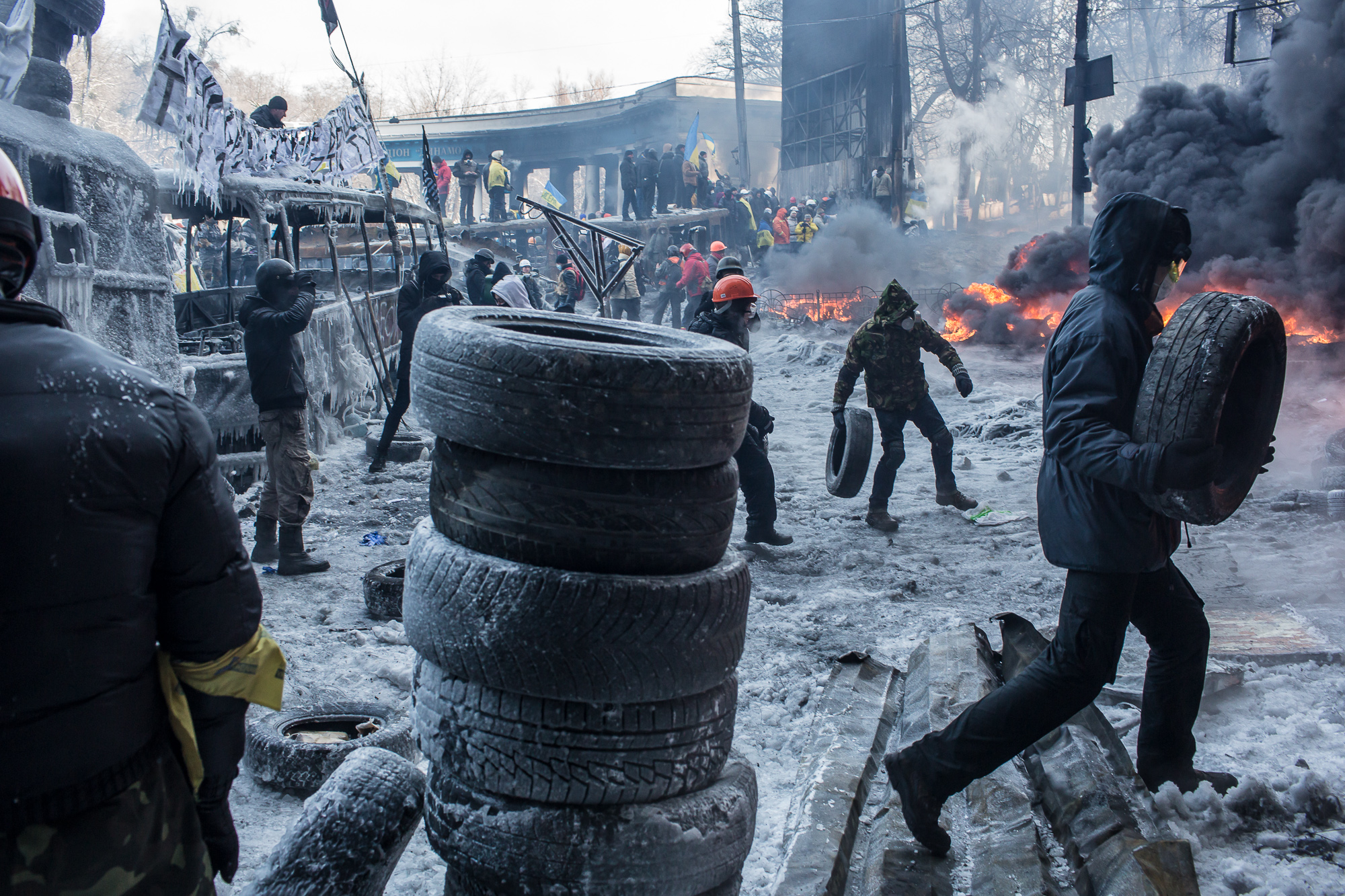  Anti-government protesters burn tires during clashes with police on Hrushevskoho Street near Dynamo stadium on January 25, 2014 in Kiev, Ukraine. After two months of primarily peaceful anti-government protests in the city center, new laws meant to e