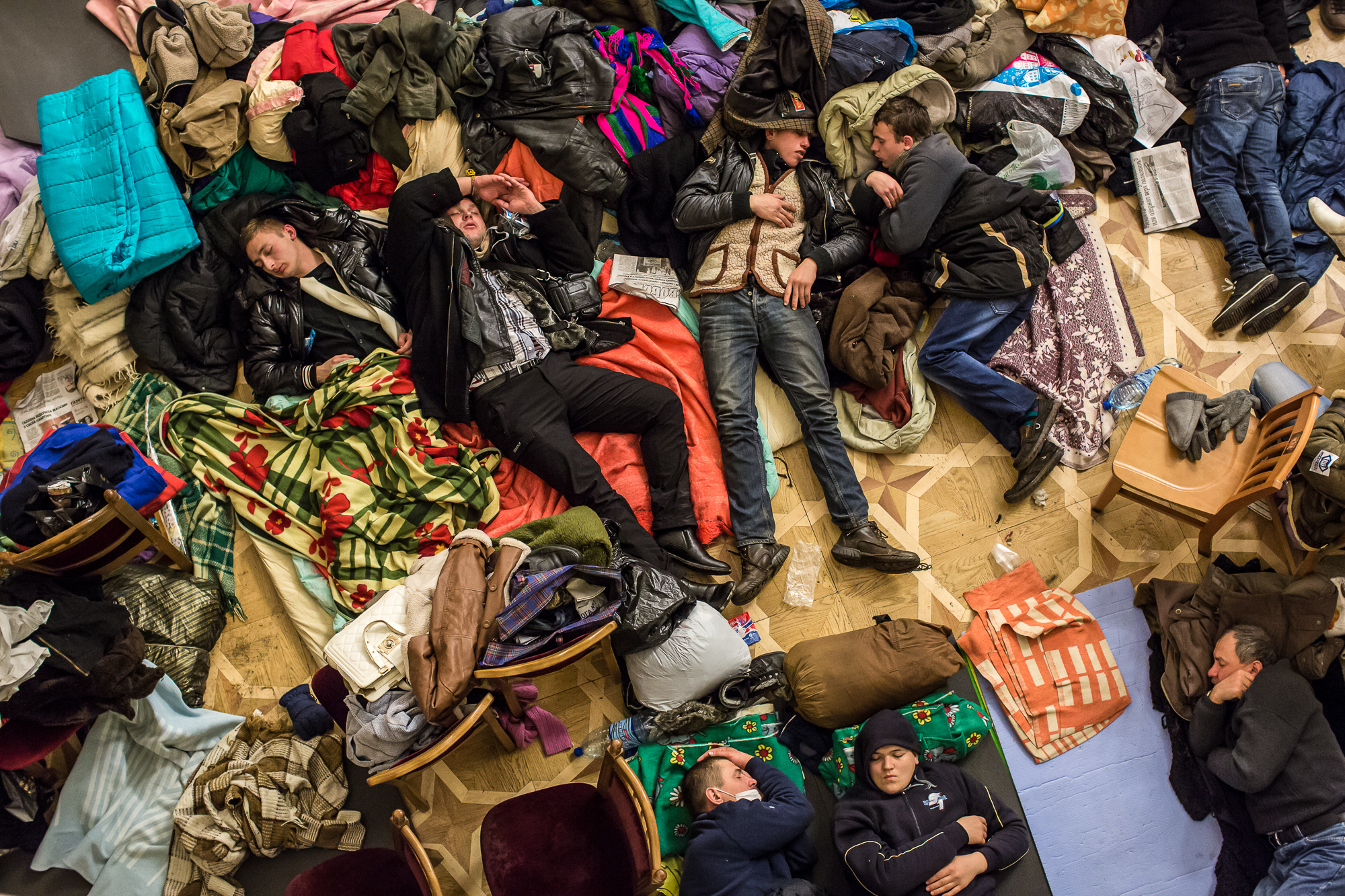  Anti-government protesters sleep on the floor of the occupied Kiev City Hall on December 7, 2013 in Kiev, Ukraine. Thousands of people have been protesting against the government since a decision by Ukrainian president Viktor Yanukovych to suspend a