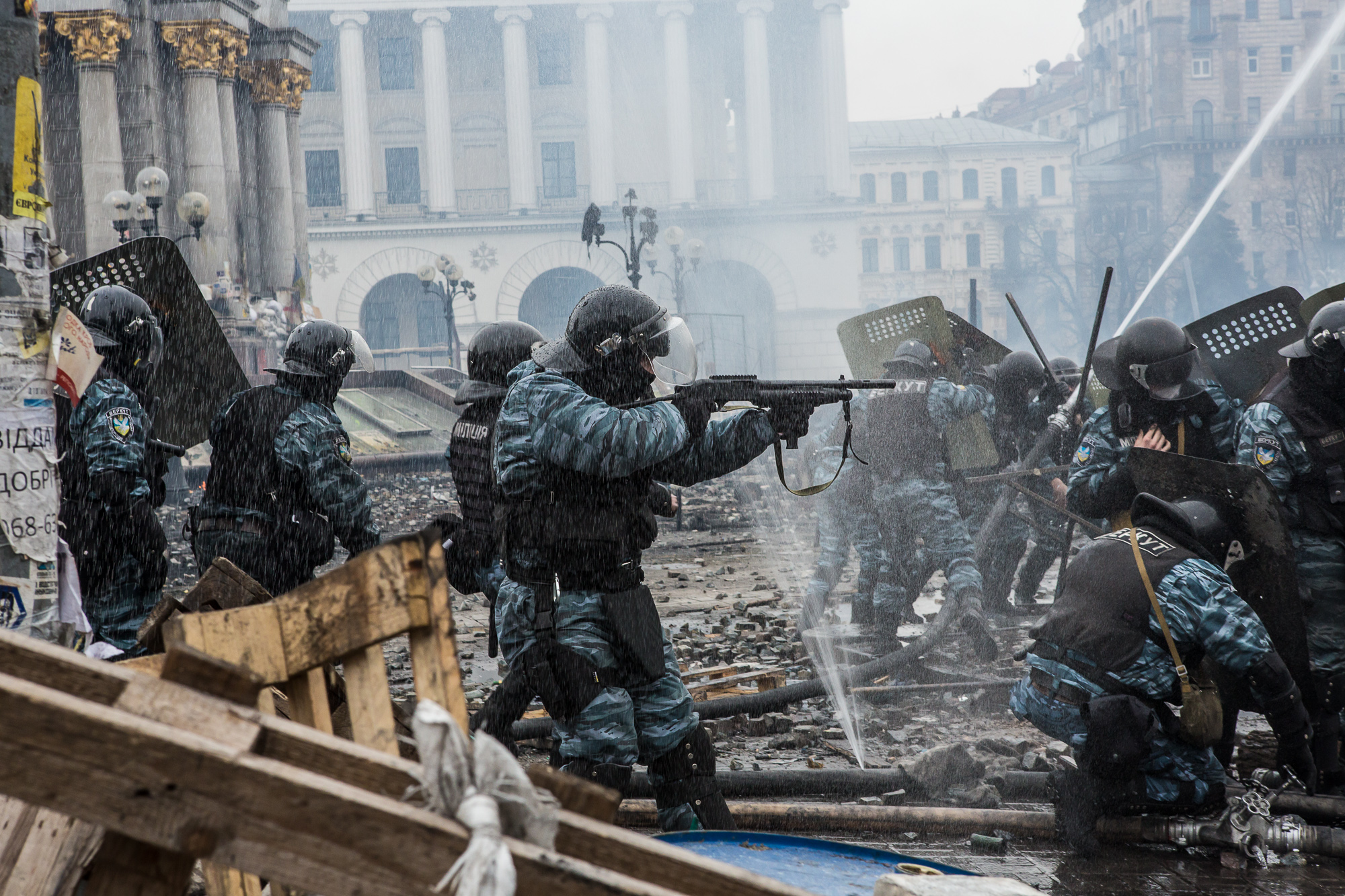  Berkut riot police shoot rubber bullets toward anti-government protesters on Independence Square on February 19, 2014 in Kiev, Ukraine. After several weeks of calm, violence has again flared between anti-government protesters and police as the Ukrai
