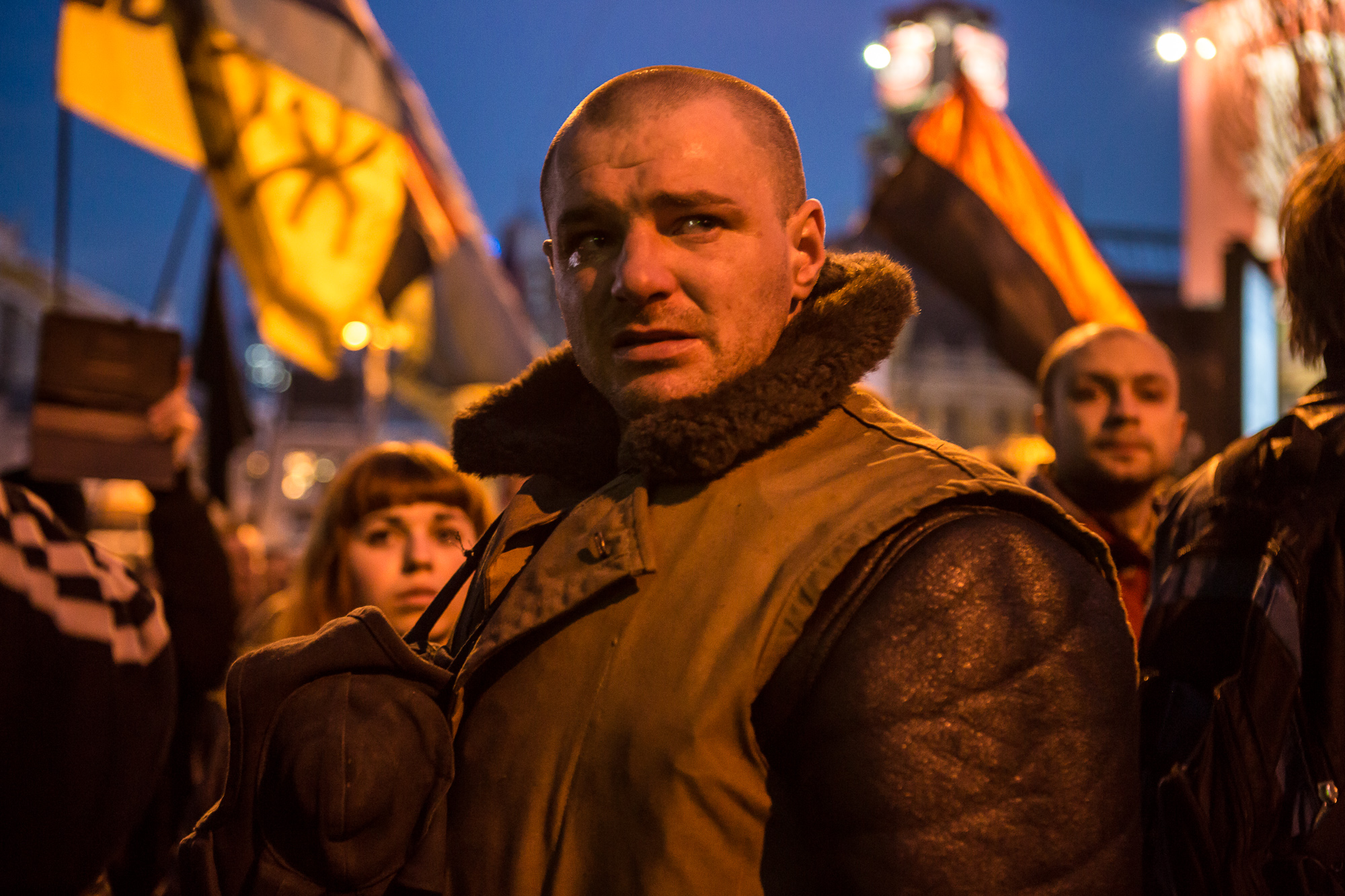  A man cries after seeing the body of Ustim Holodnyuk, 19, who was killed in fighting between anti-government protesters and police, carried in procession through Independence Square on February 21, 2014 in Kiev, Ukraine. After a week that saw new le