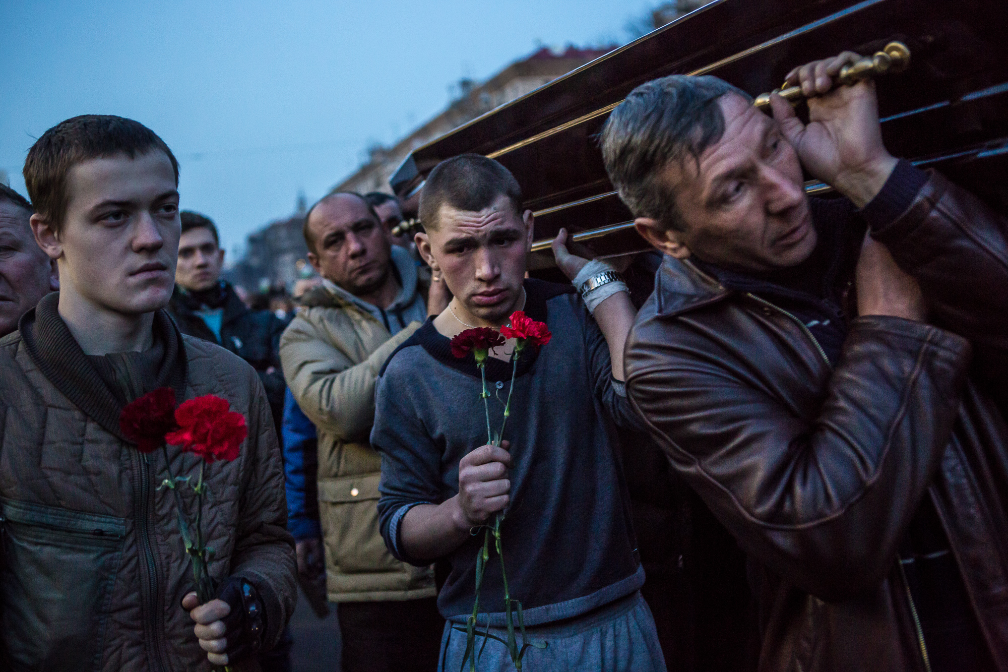  Men carry a casket containing the body of an anti-government protester killed in clashes with police from Independence Square on February 21, 2014 in Kiev, Ukraine. After a week that saw new levels of violence, with dozens killed, opposition and gov