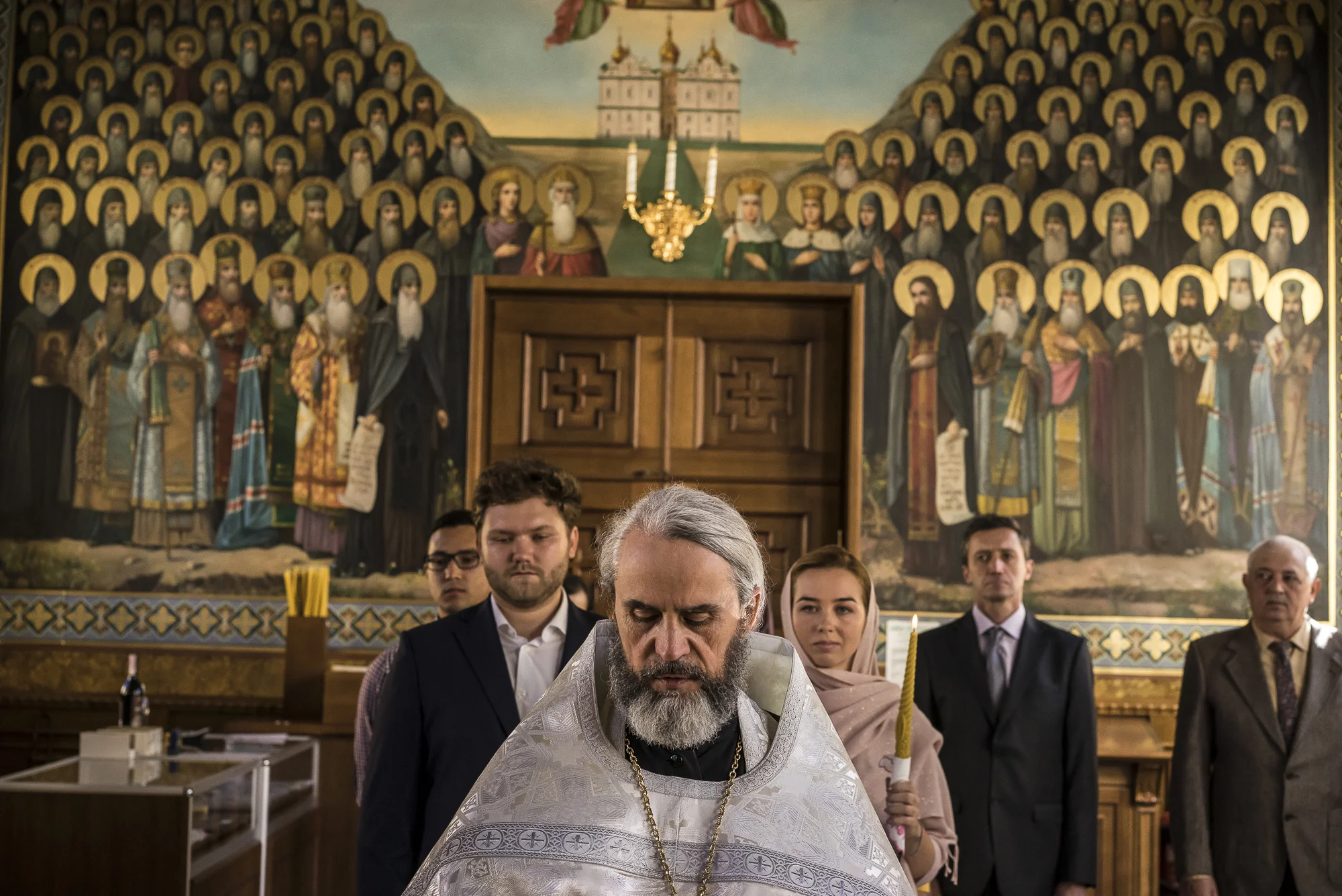 Father Philip conducts the wedding of Yevgeny Bolonnikov, second from left, and Katerina, third from right, at Life Spring Church at the Kyiv-Pechersk Lavra on Sunday, October 7, 2018 in Kyiv, Ukraine.