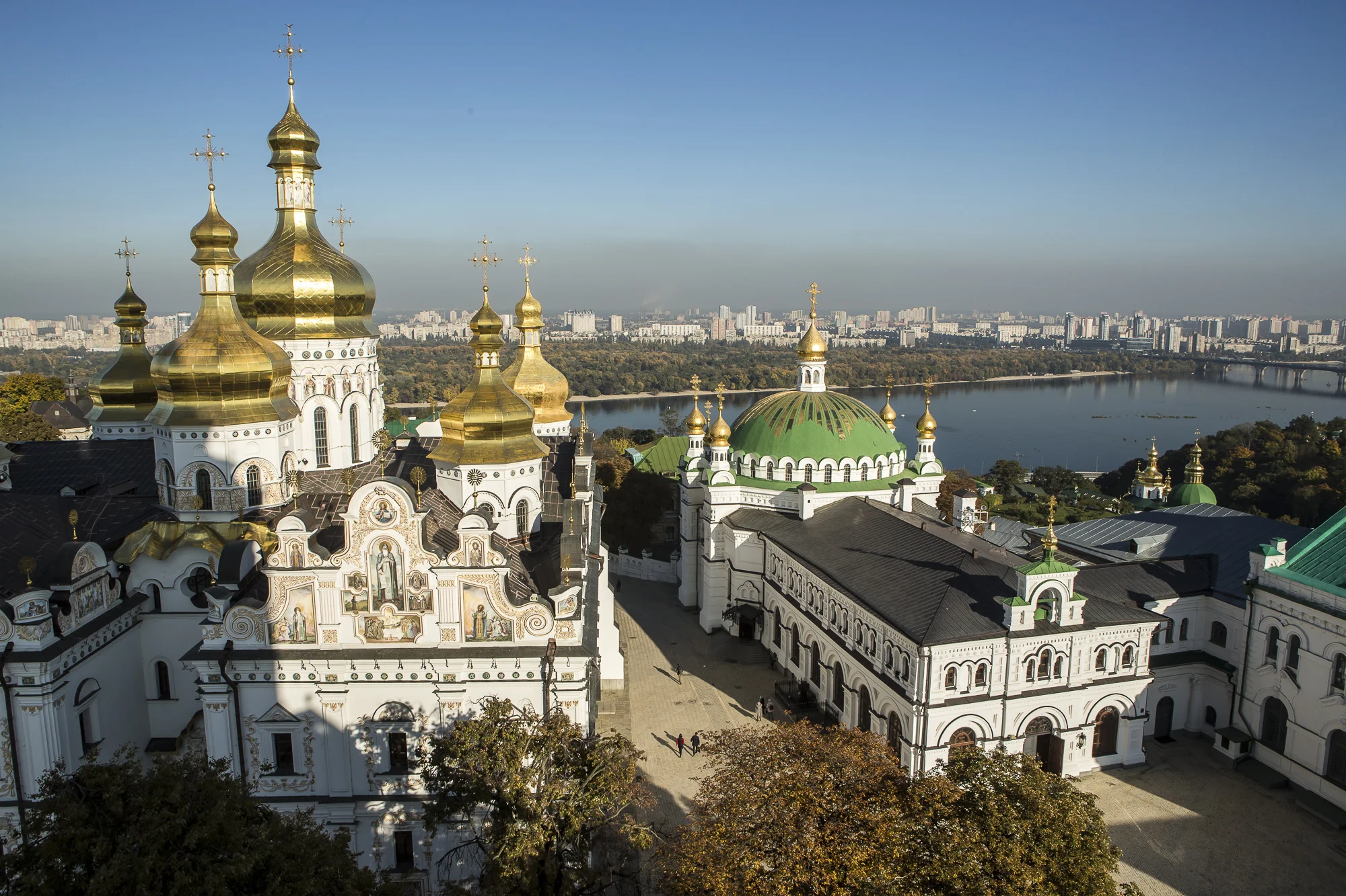 The Holy Dormition Cathedral, left, and the Refectory Church of Sts. Anthony and Theodosius as seen from the Great Lavra Bell Tower at the Kyiv-Pechersk Lavra on Wednesday, October 10, 2018 in Kyiv, Ukraine.