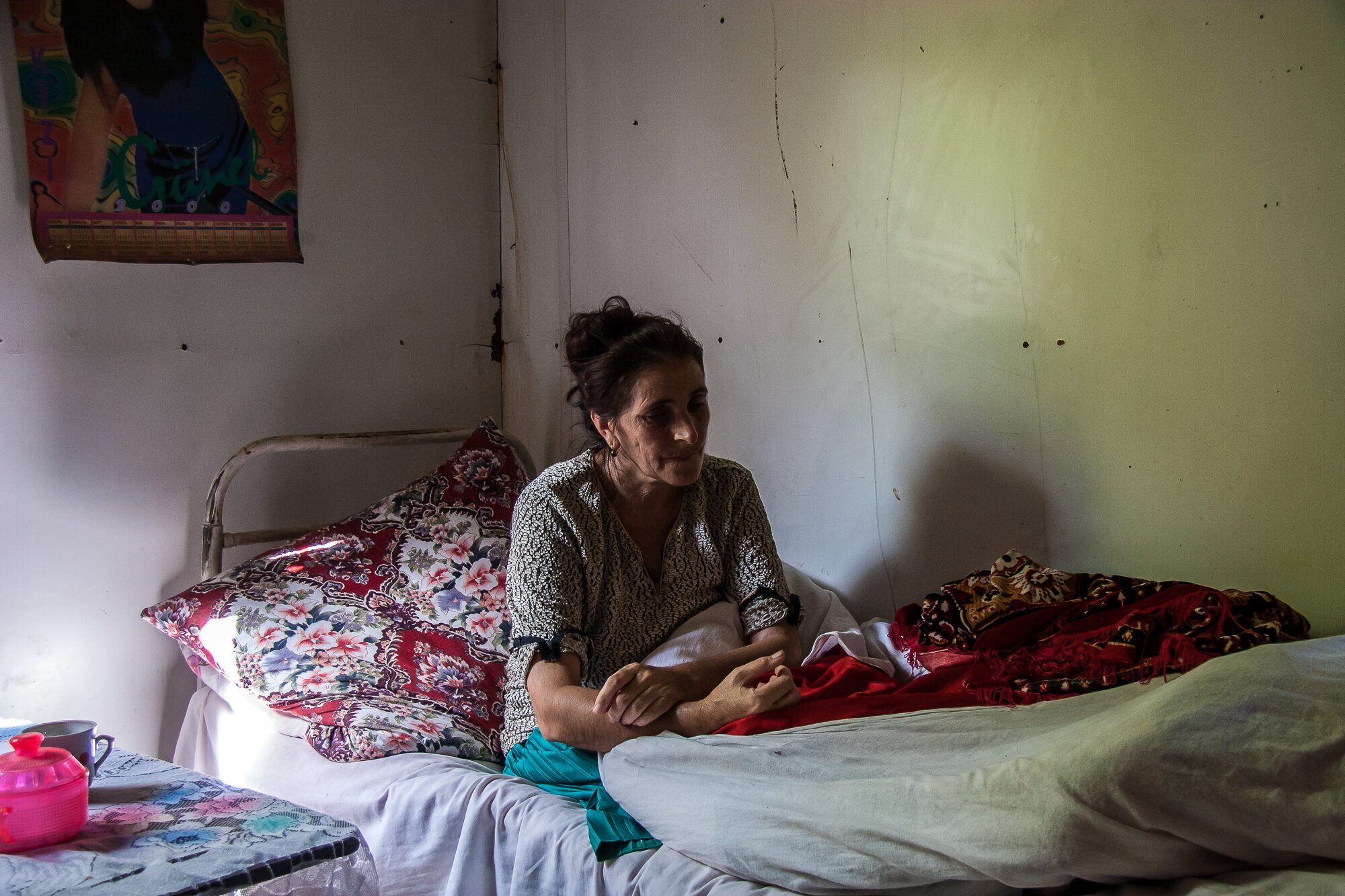  A woman in temporary housing in a camp for people displaced from Nagorno-Karabakh. Agdam region, Azerbaijan. 2006. 
