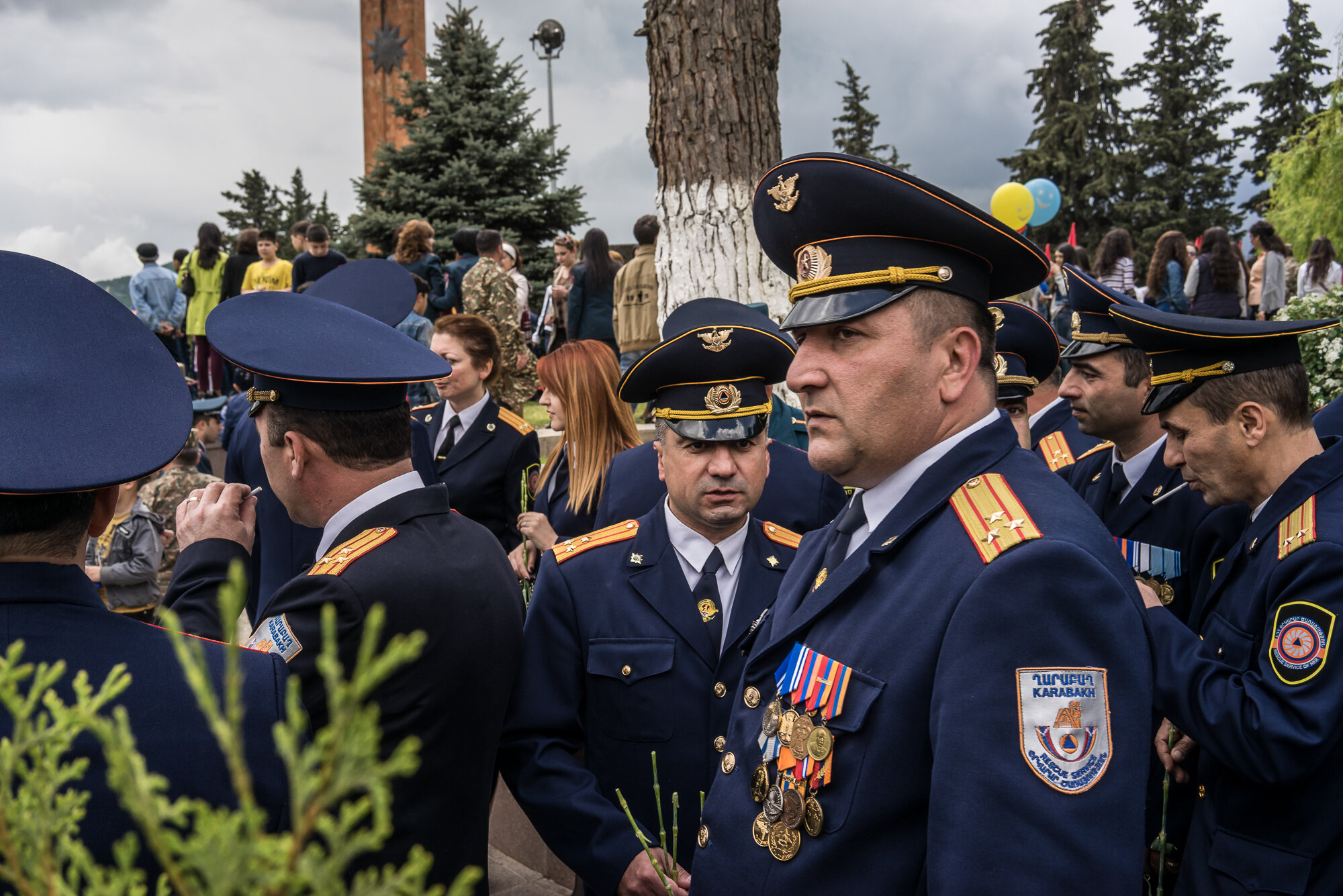  Military officers wait for the start of a ceremony commemorating both the victory over Nazi Germany in the Second World War as well as the fall of the strategic town of Shushi to Armenian forces. Stepanakert, Nagorno-Karabakh. 2016. 