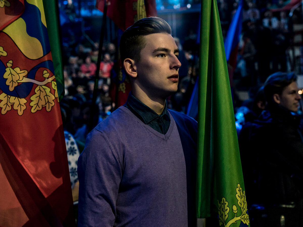  A student attends a concert in support of Belarusian president Alexander Lukashenko which was recorded for later broadcast on state television on Friday, October 9, 2015 in Minsk, Belarus. 