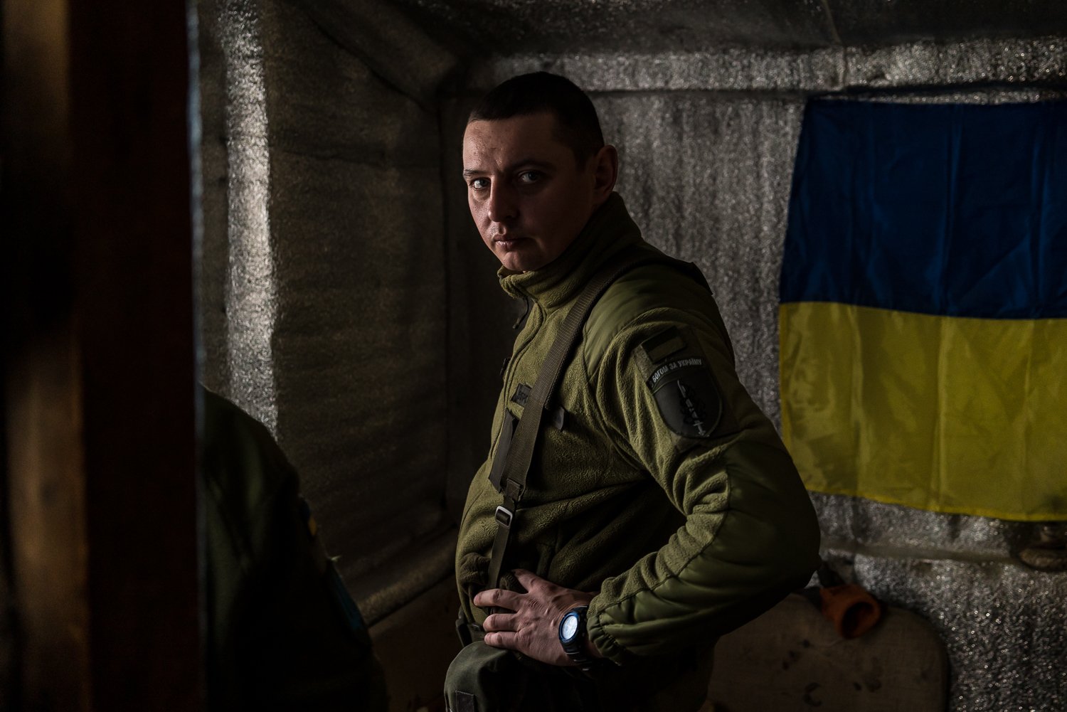  Ruslan, a Ukrainian soldier with the 53rd Mechanized Brigade, at a house near the front-line on Saturday, January 29, 2022 in Chermalyk, Ukraine. 
