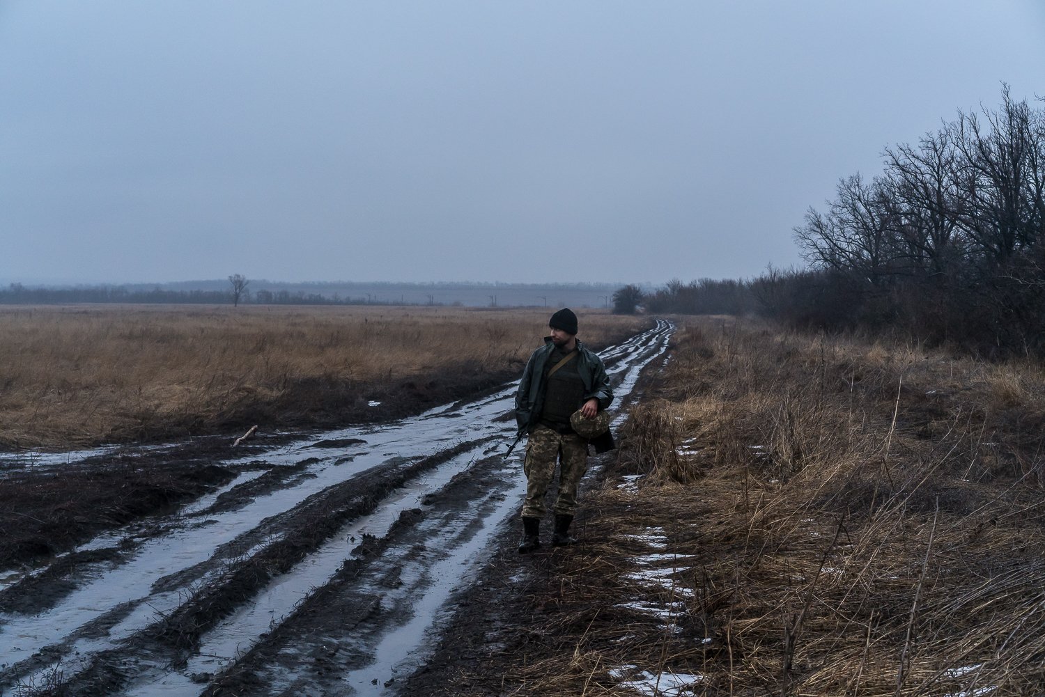  Ihor, a Ukrainain Marine from the 503rd Marine Battalion, at walks between front-line positions on Tuesday, February 8, 2022 in Verkhnotoretske, Ukraine. 