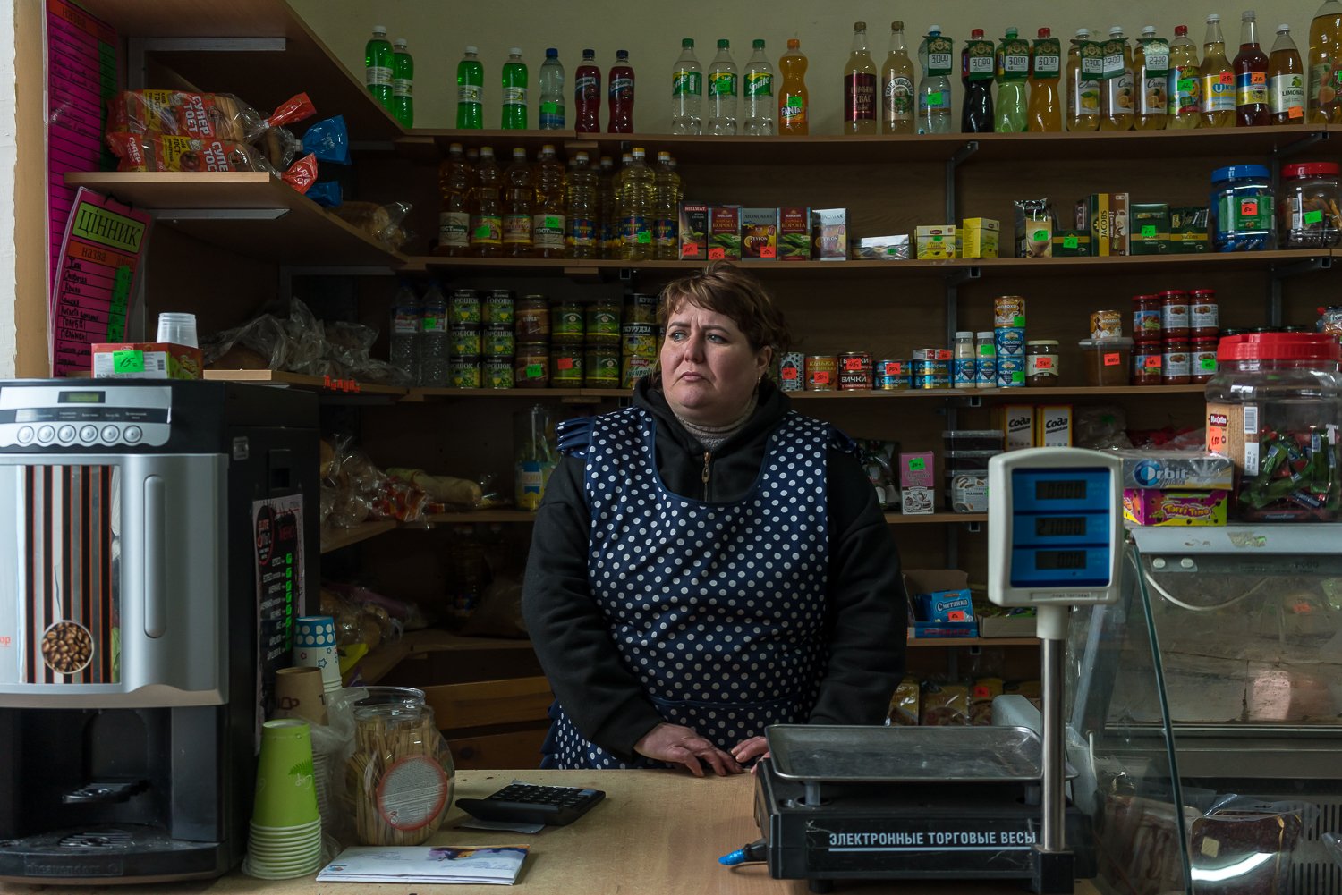  Nina Boyko, 40, whose house is being repaired by volunteers from Repair Together after it was destroyed during the Russian occupation last March, at the shop she owns in the village on Saturday, April 15, 2023 in Lukashivka, Ukraine. 
