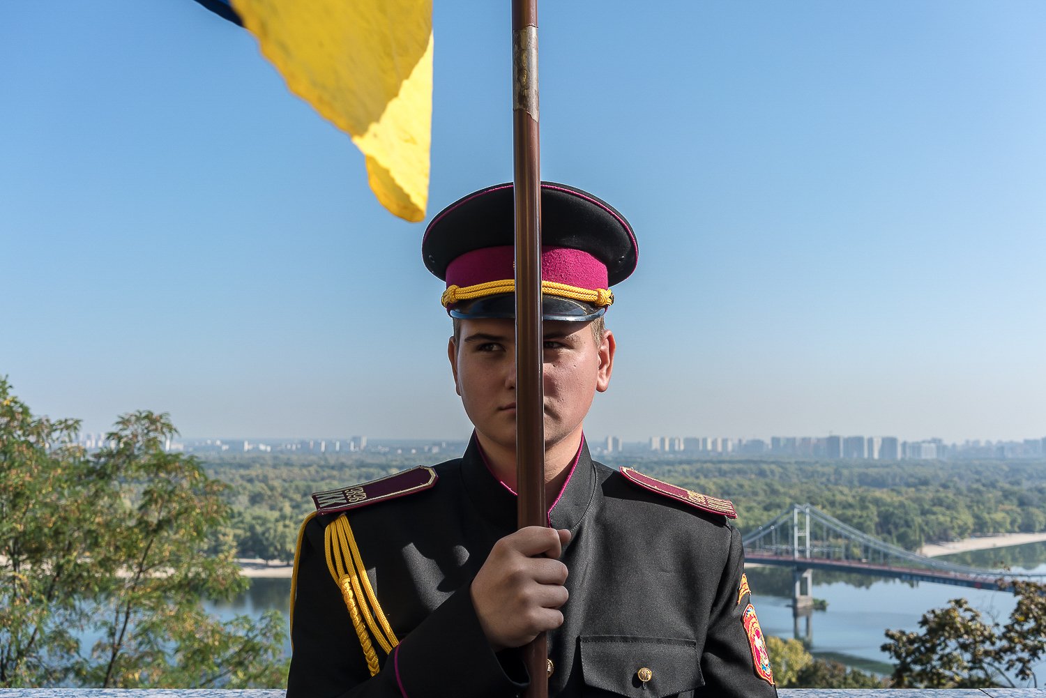  A student at a military boarding school, Lyceum No. 23, holds a Ukrainian flag during a ceremony awarding epaulettes to students on Friday, September 29, 2023 in Kyiv, Ukraine. 