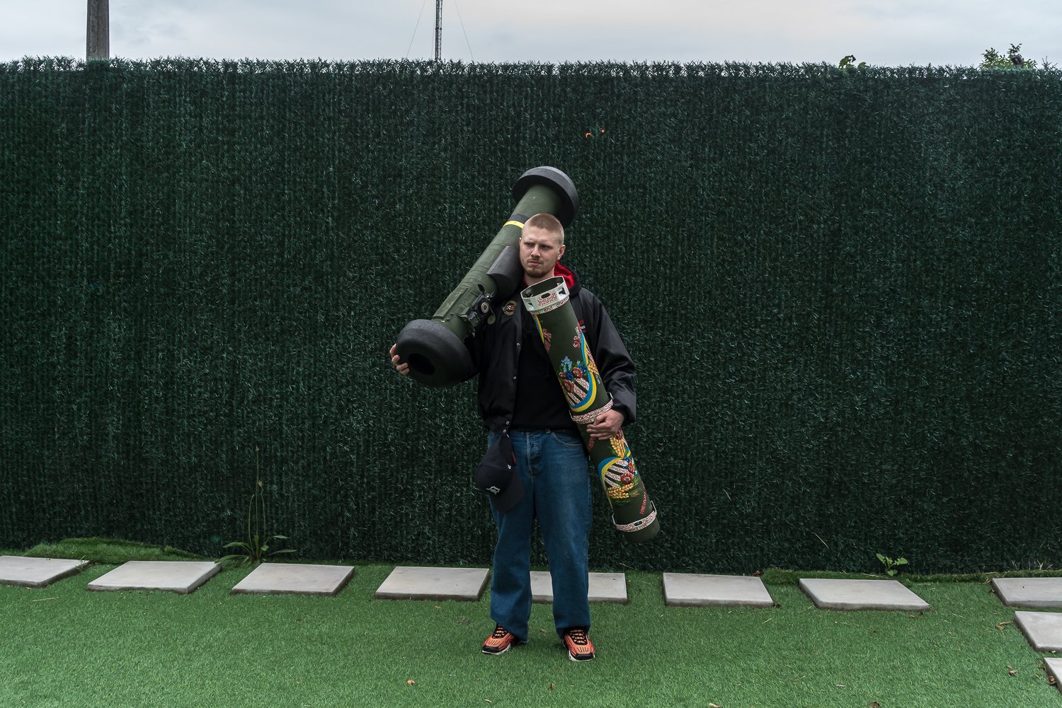  Mykhailo Borshchevych, 22, a student at the Salvador Dali Academy of Contemporary Art, poses for a portrait holding a painted rocket tube and a used Javelin anti-tank missile launcher on Monday, June 12, 2023 in Kyiv, Ukraine. Mr. Borshchevych is pa